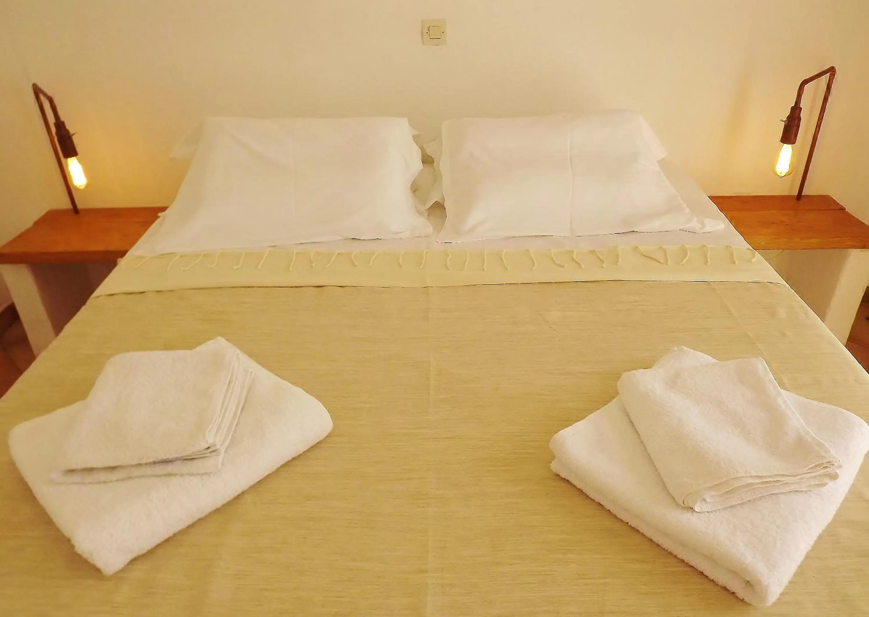 Bed in Votsalo Apartments