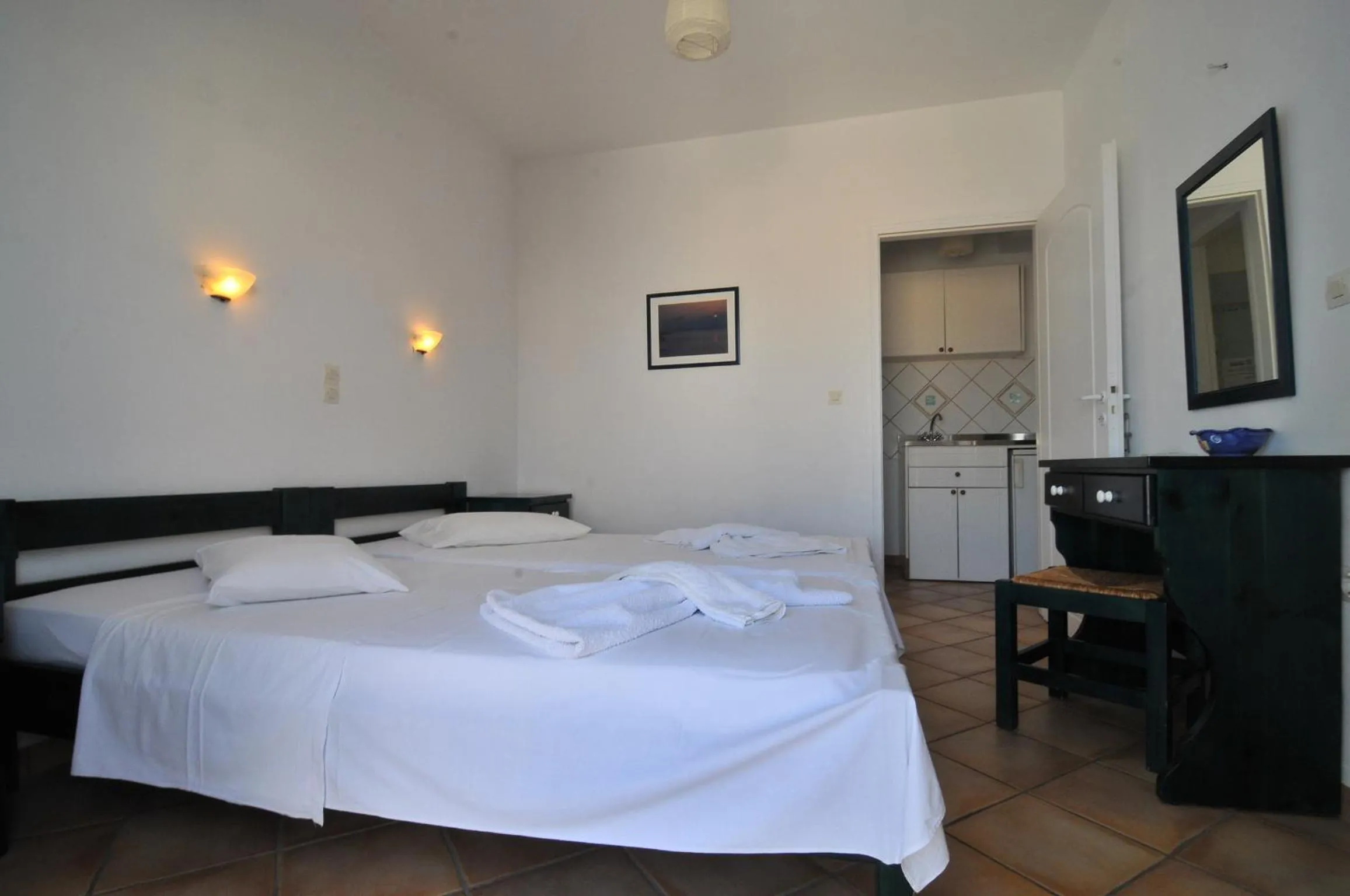 Bed in Votsalo Apartments