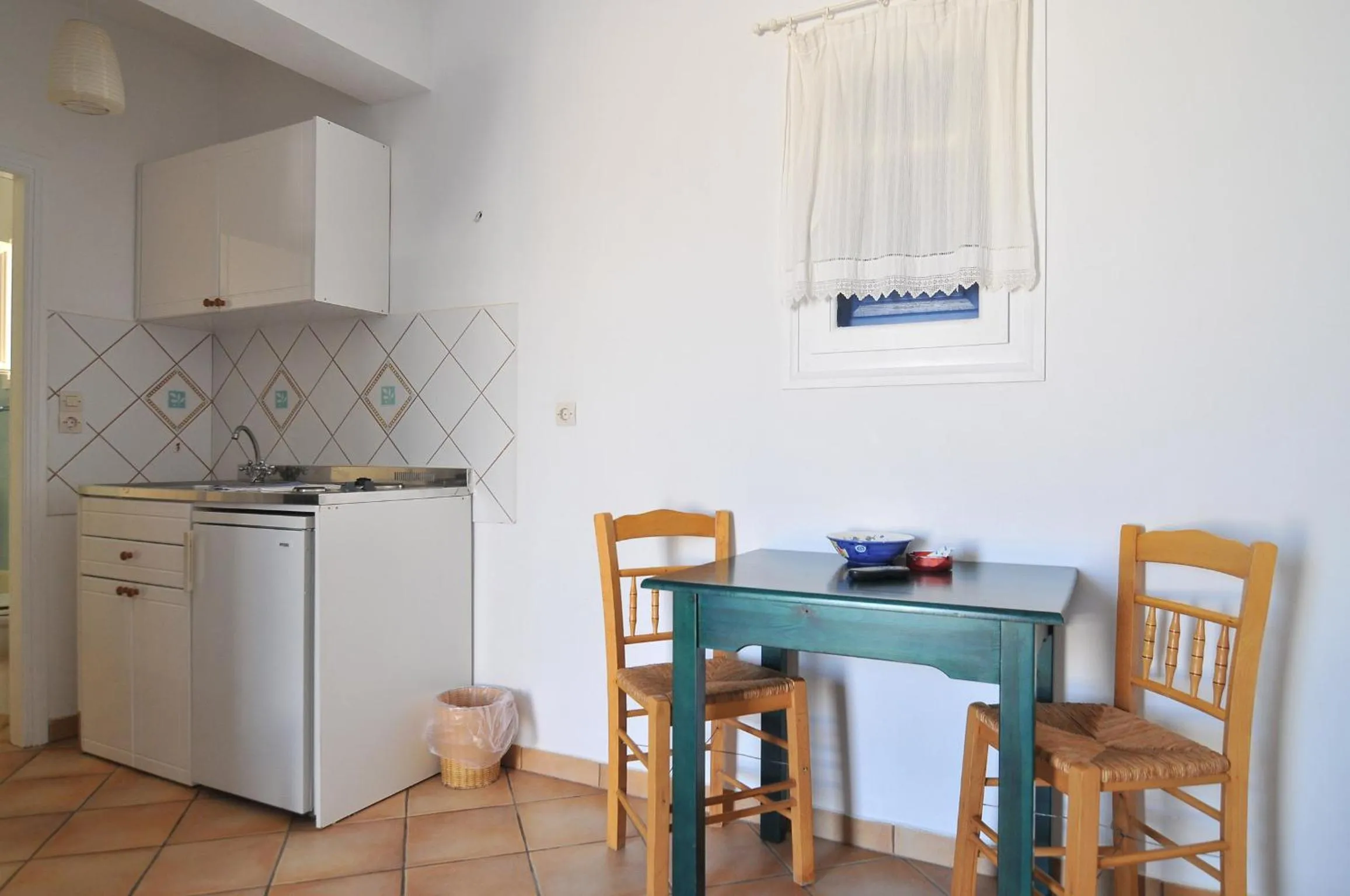 Kitchen or kitchenette in Votsalo Apartments