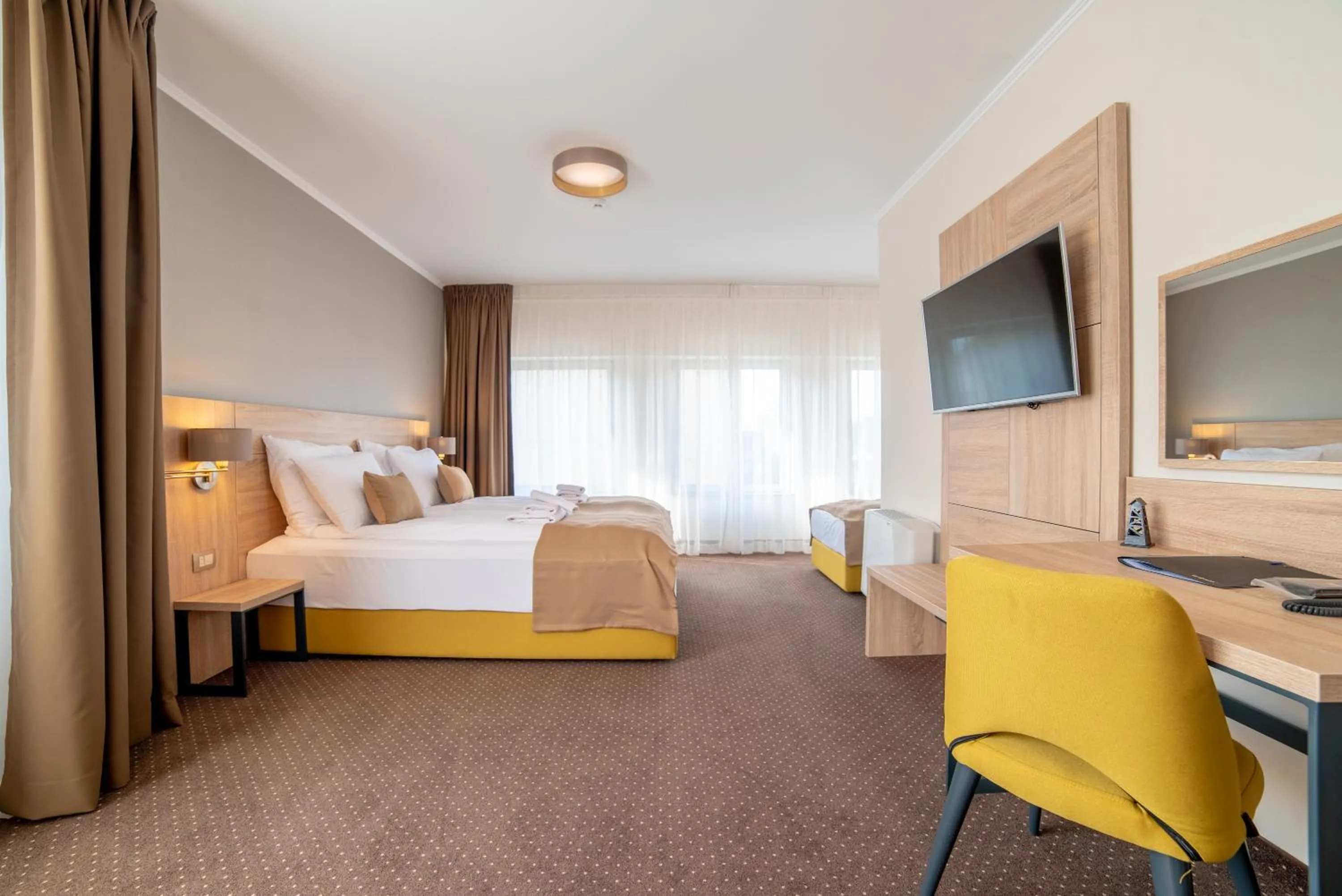 Bed in Hotel Soni Lux