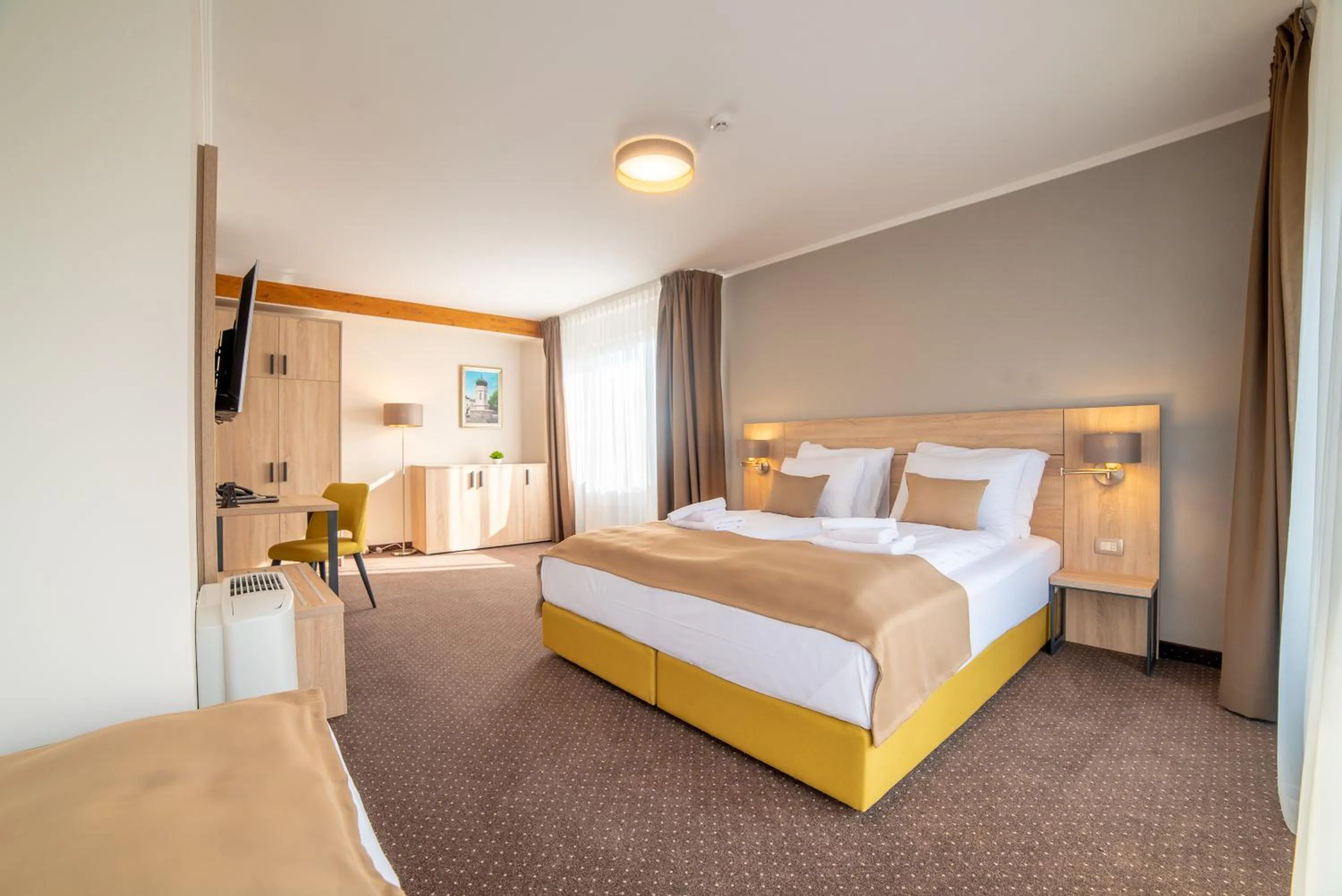 Bed in Hotel Soni Lux