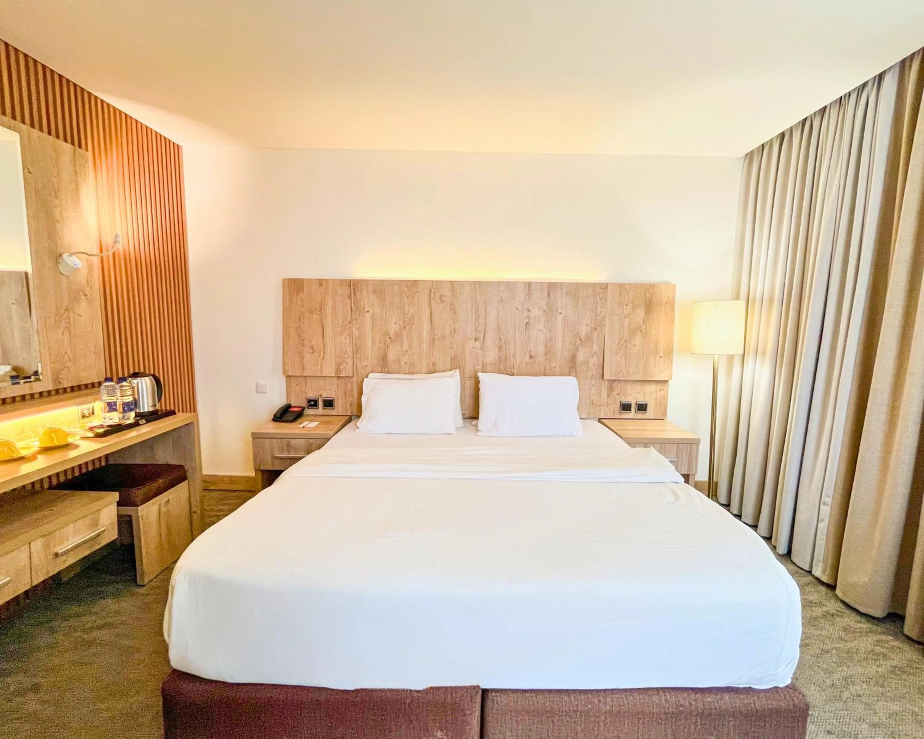 Bed in La Casa Hotel Amman by FHM