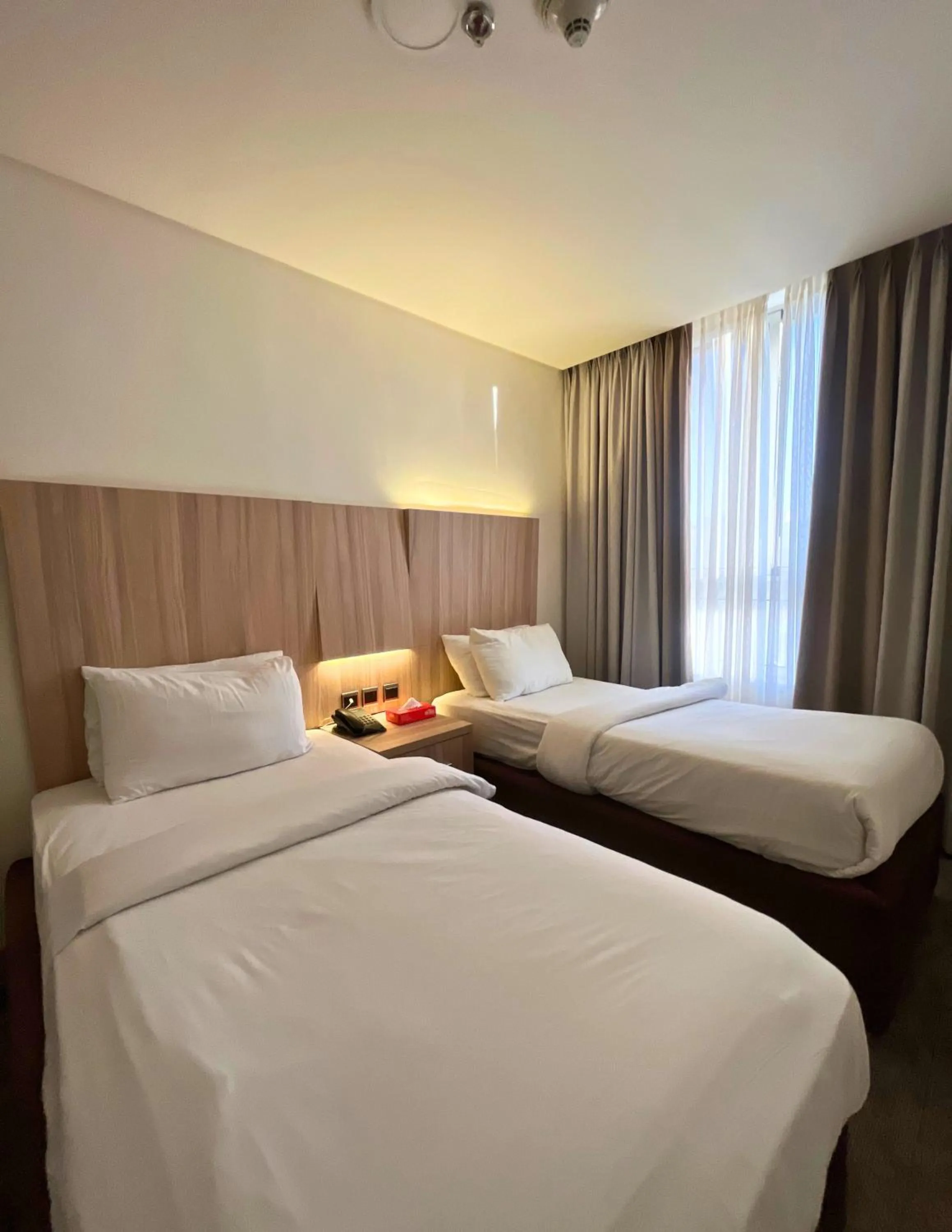 Bed in La Casa Hotel Amman by FHM