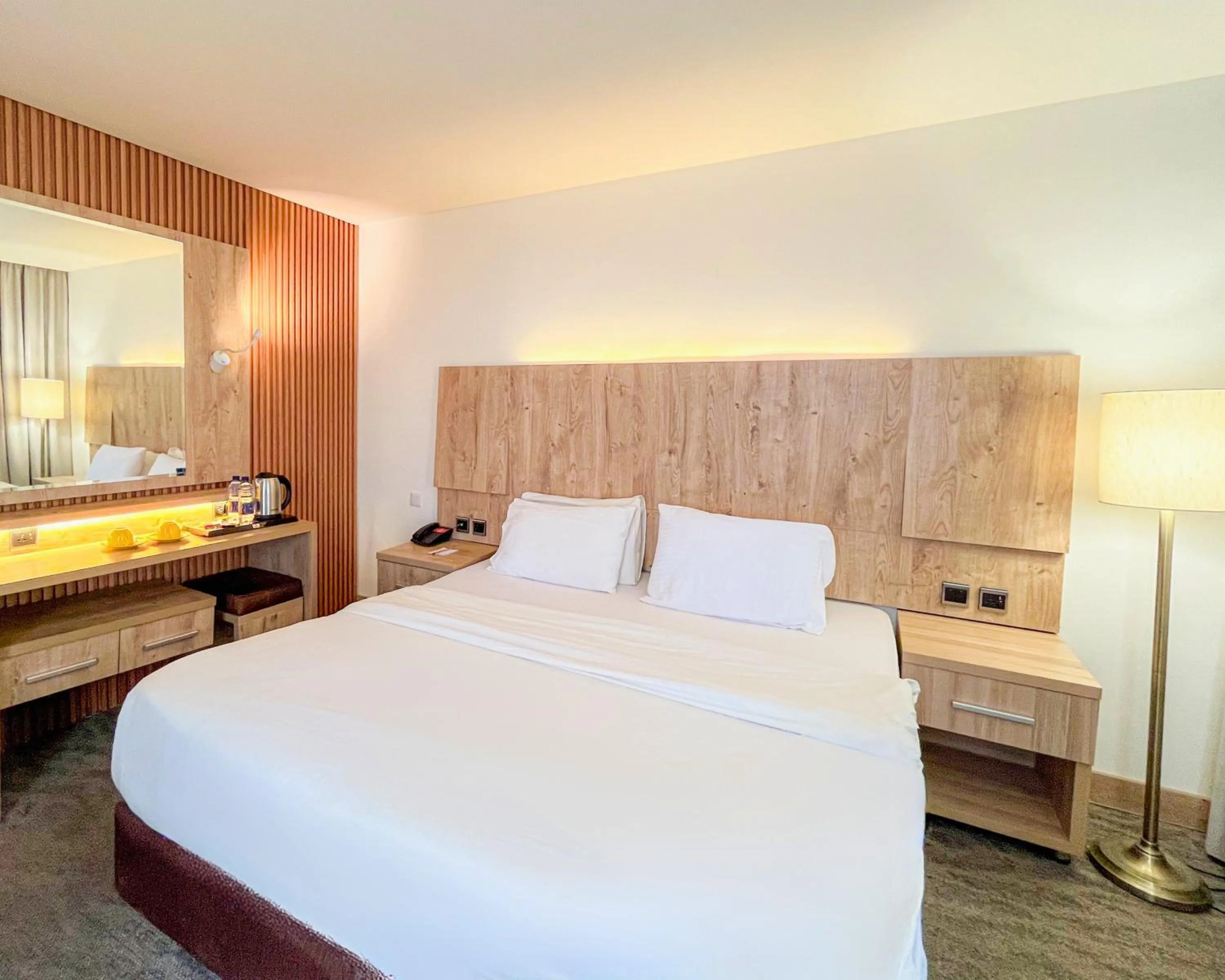 Bed in La Casa Hotel Amman by FHM