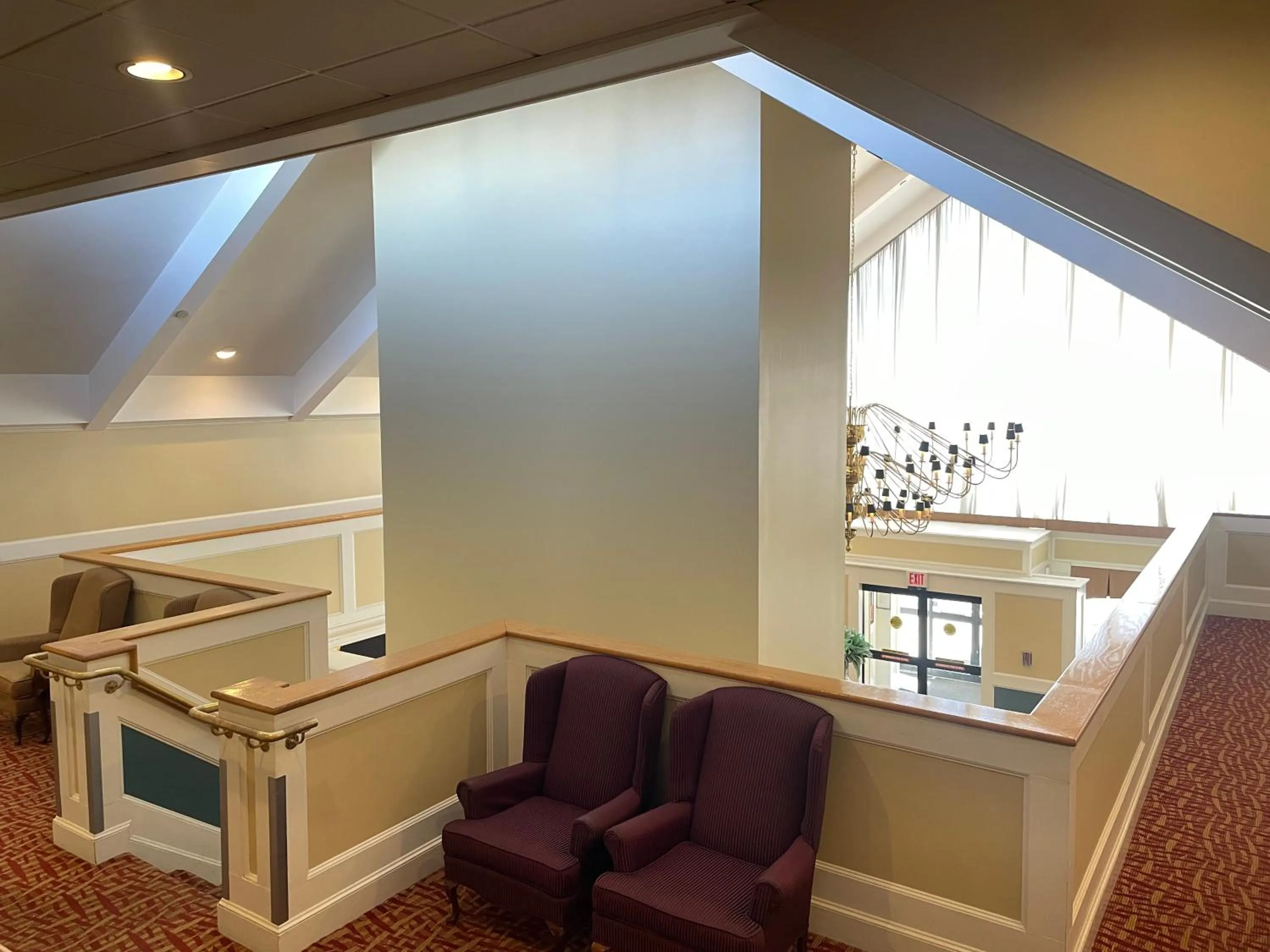 Communal lounge/ TV room in Ramada by Wyndham Seekonk Providence Area