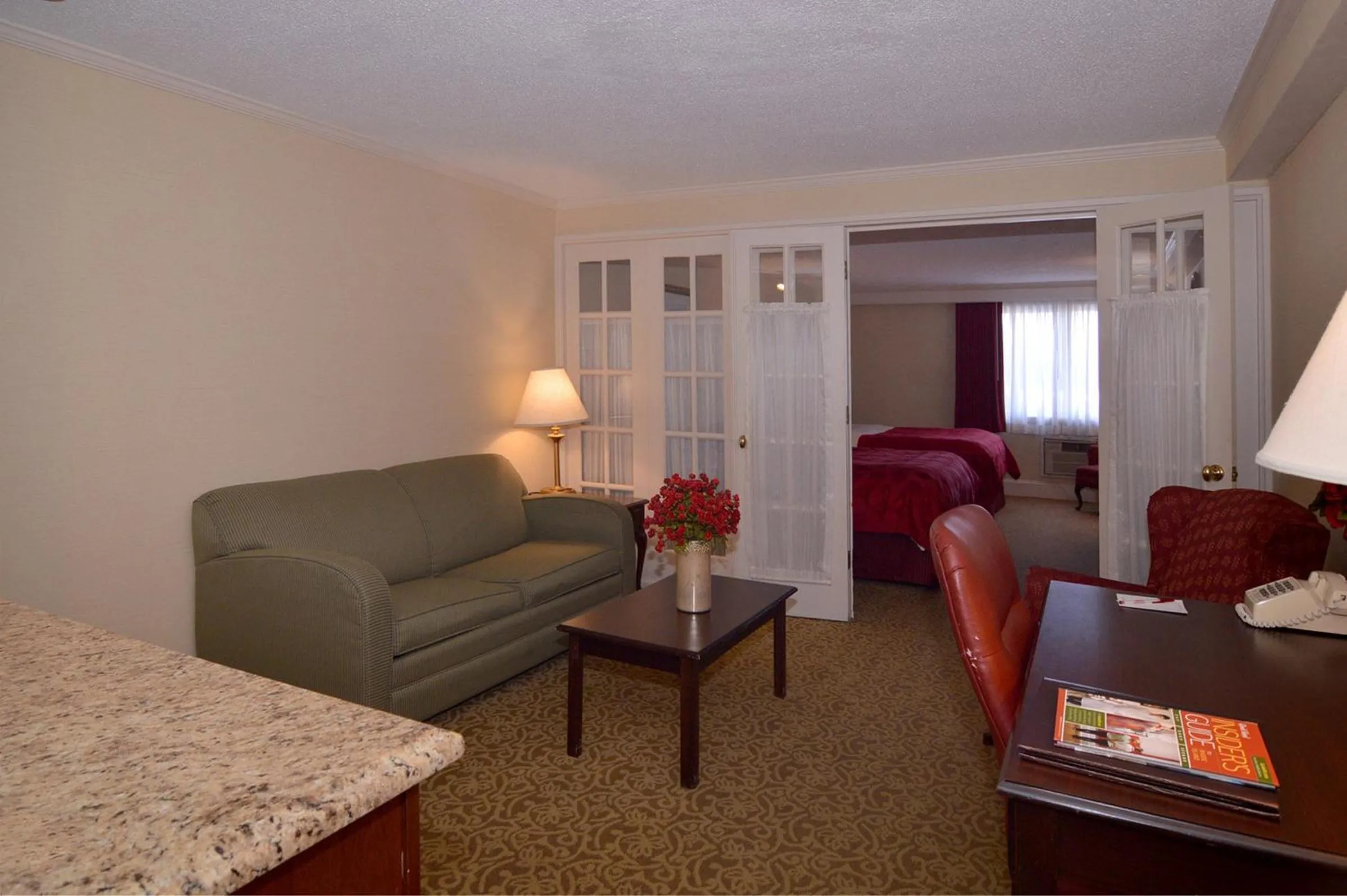 Living room in Ramada by Wyndham Seekonk Providence Area