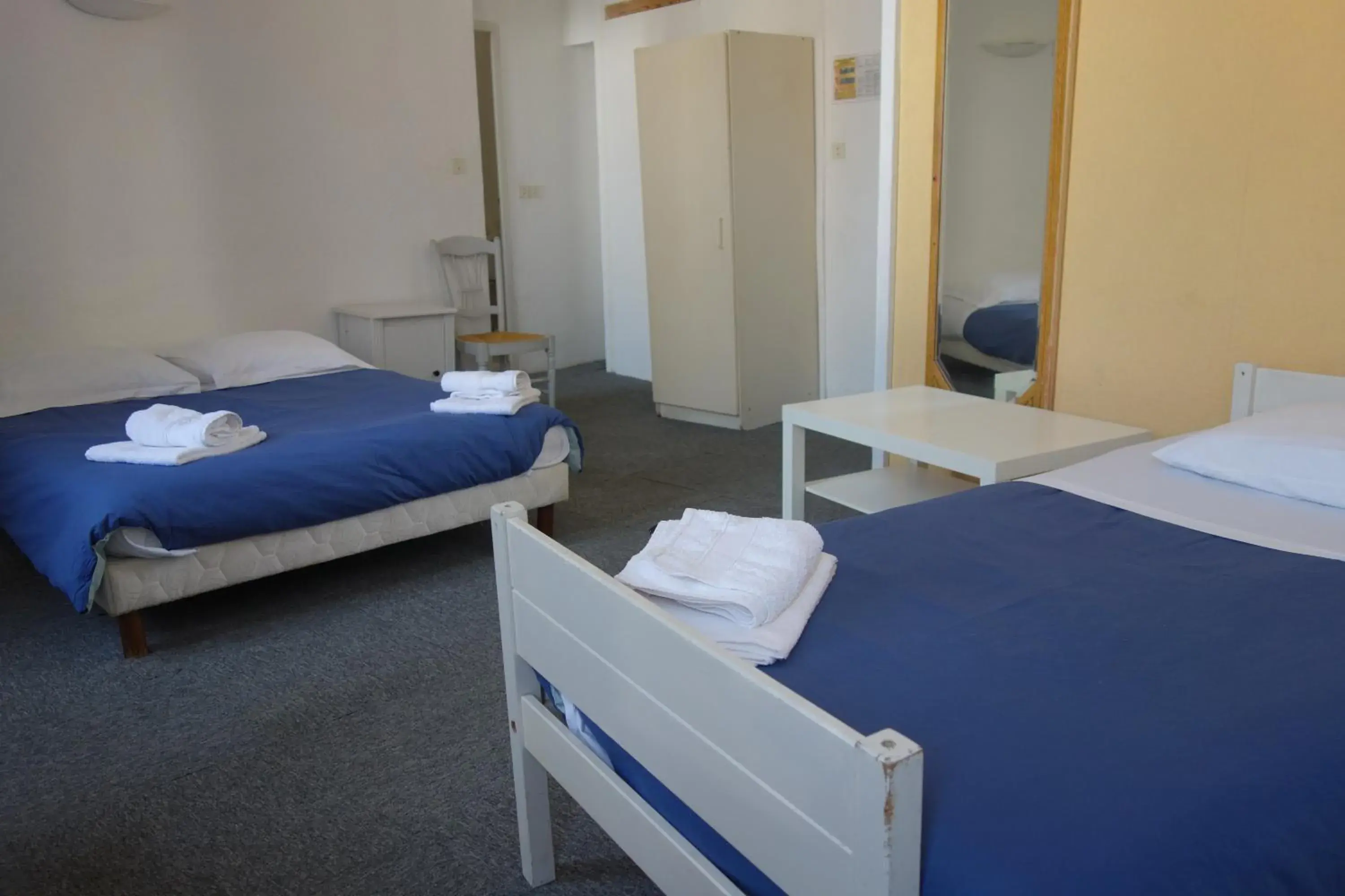 Communicating Rooms - 4 People in Hôtel Du Cours Communicating Rooms - 4 People in Hôtel Du Cours