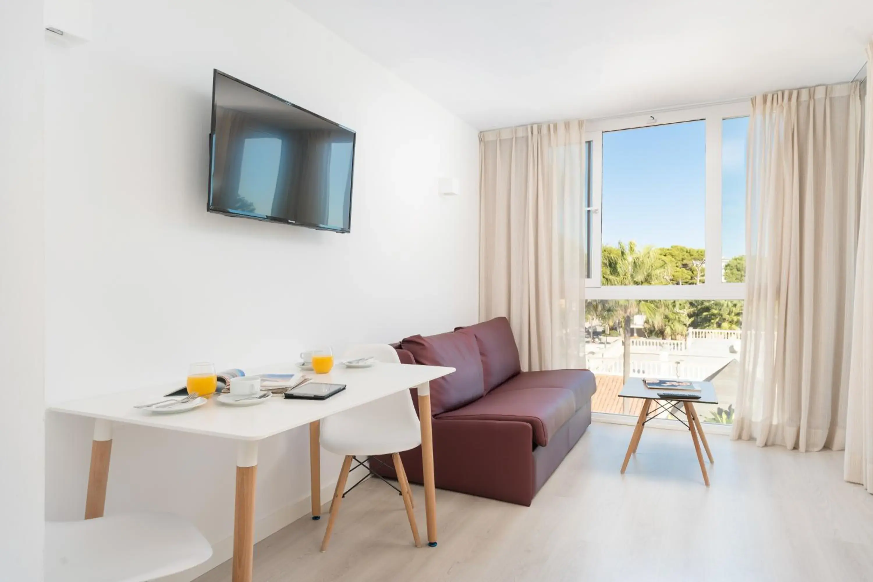 Living room in Aparthotel Ses Fotges Living room in Aparthotel Ses Fotges