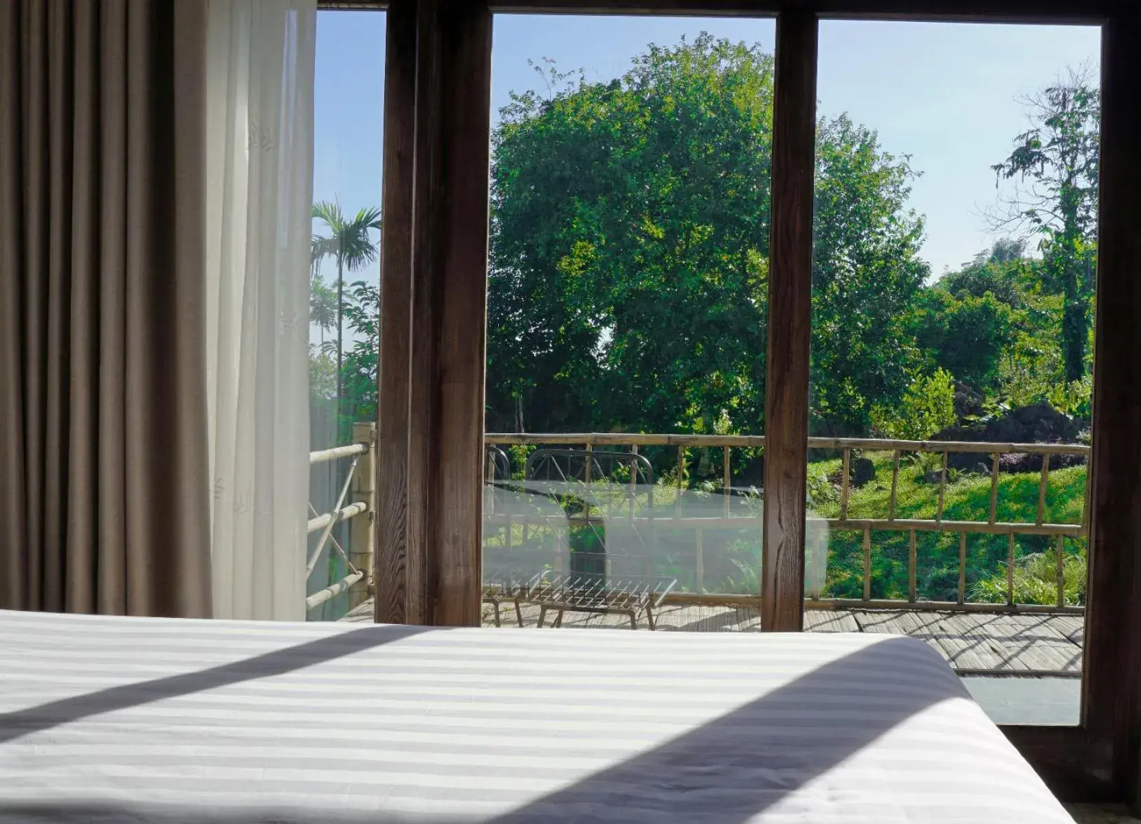 Garden view, Bed in Bakhan Village Resort Garden view, Bed in Bakhan Village Resort