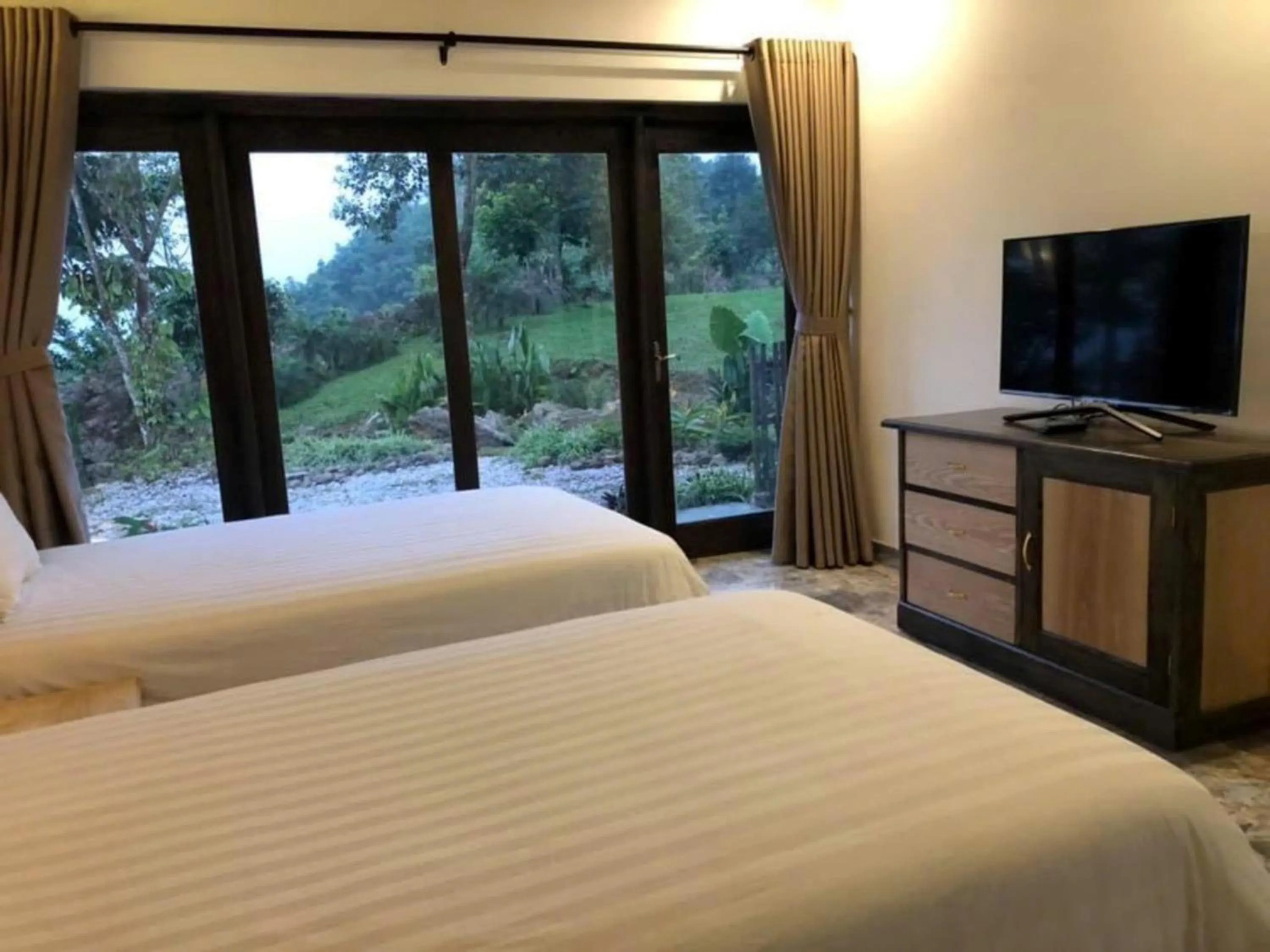 Bed in Bakhan Village Resort