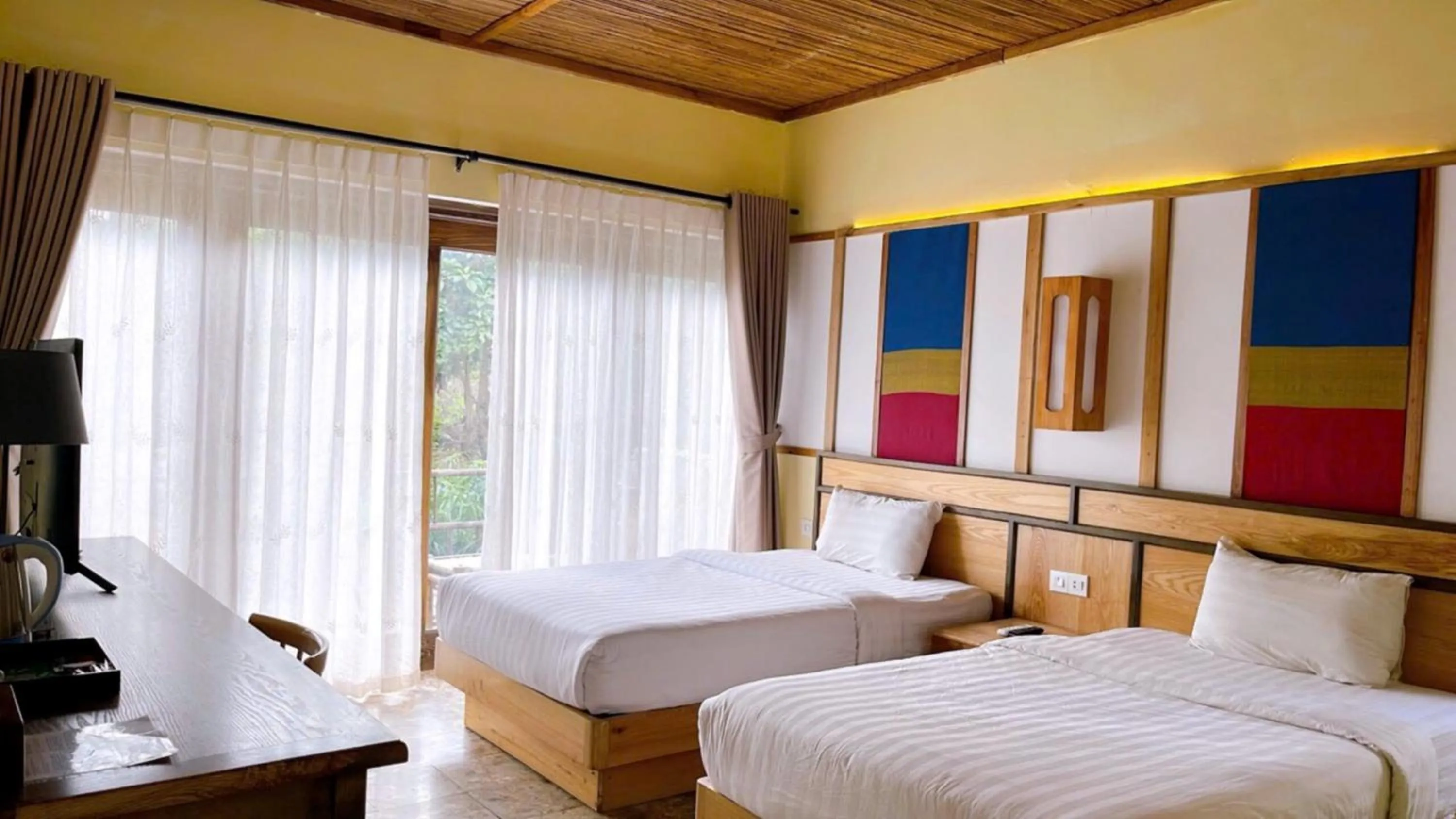 Bed in Bakhan Village Resort