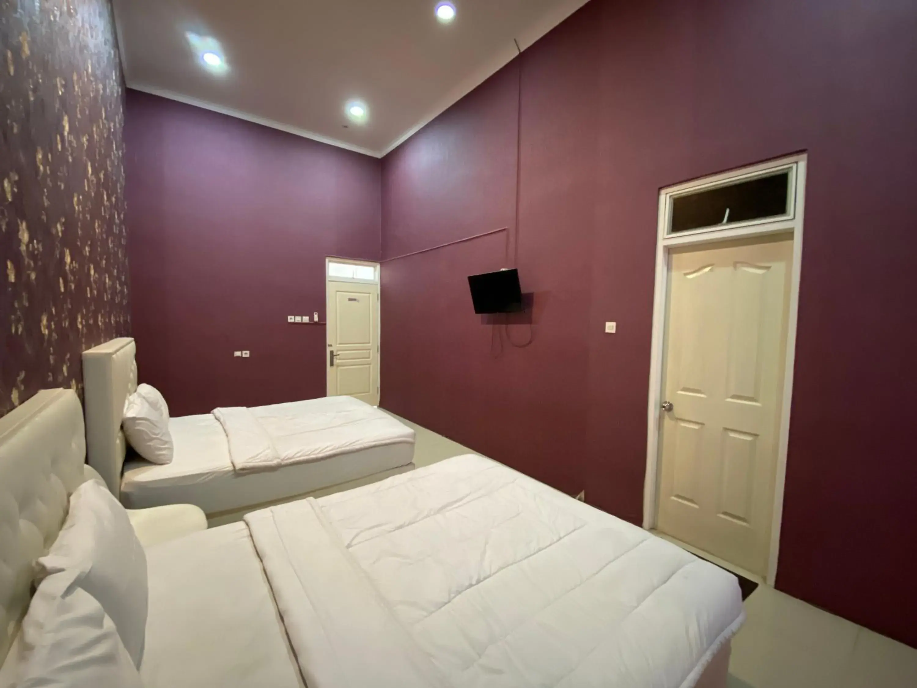 Bedroom, Bed in Griya RW Family Guest House Redpartner Bedroom, Bed in Griya RW Family Guest House Redpartner