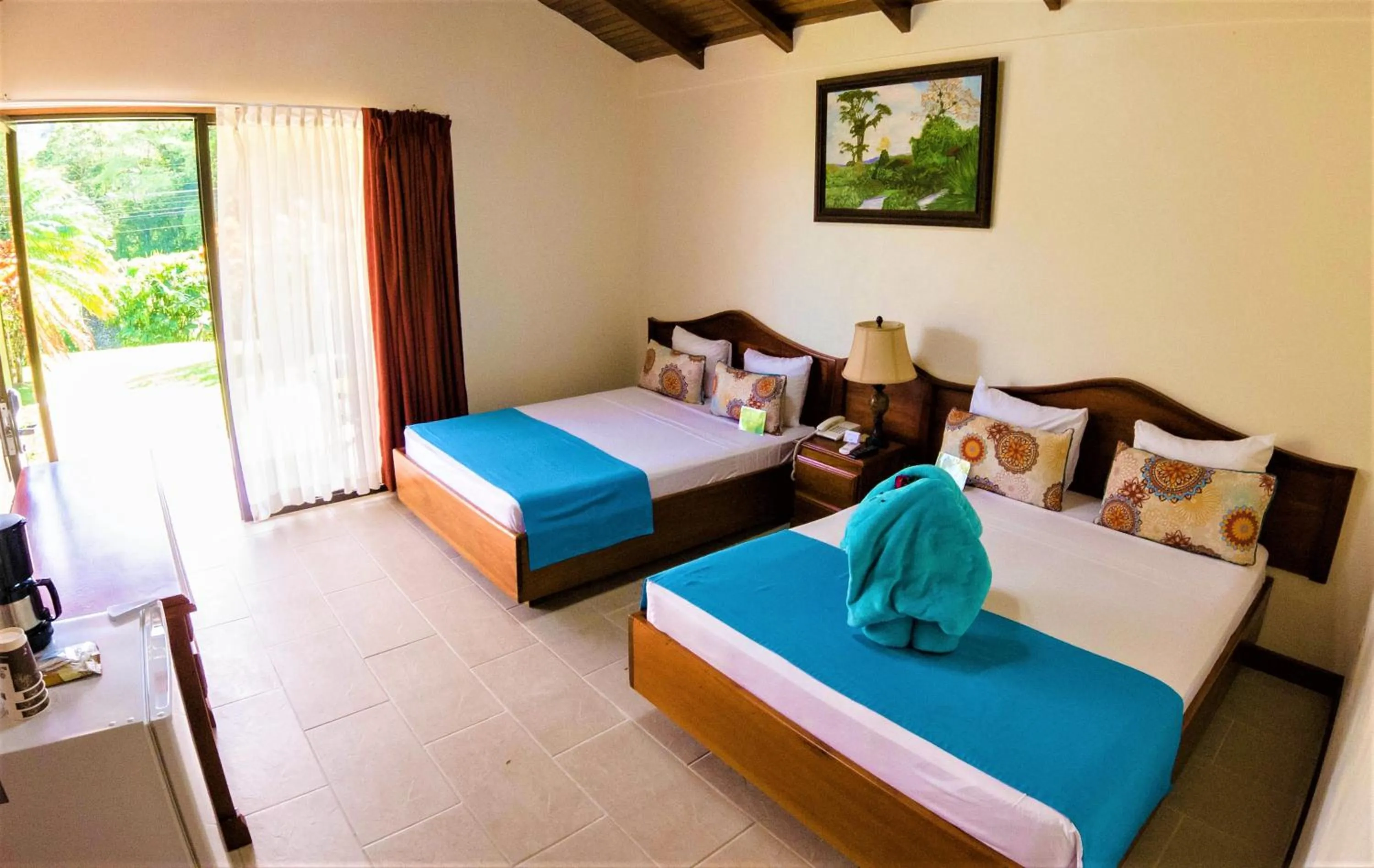 Bed in Arenal Paraiso Resort Spa & Thermo Mineral Hot Springs