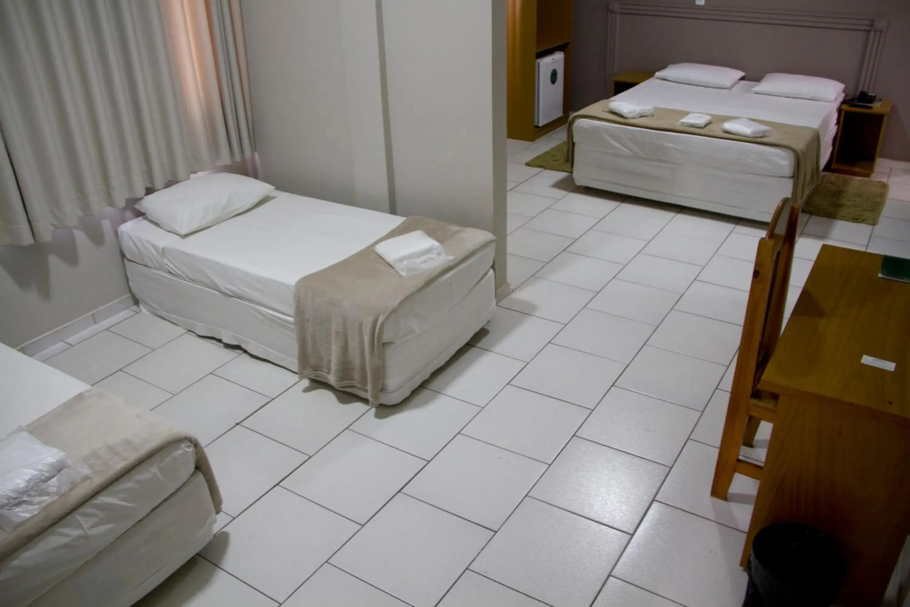 Bed in Presidente Hotel Bed in Presidente Hotel