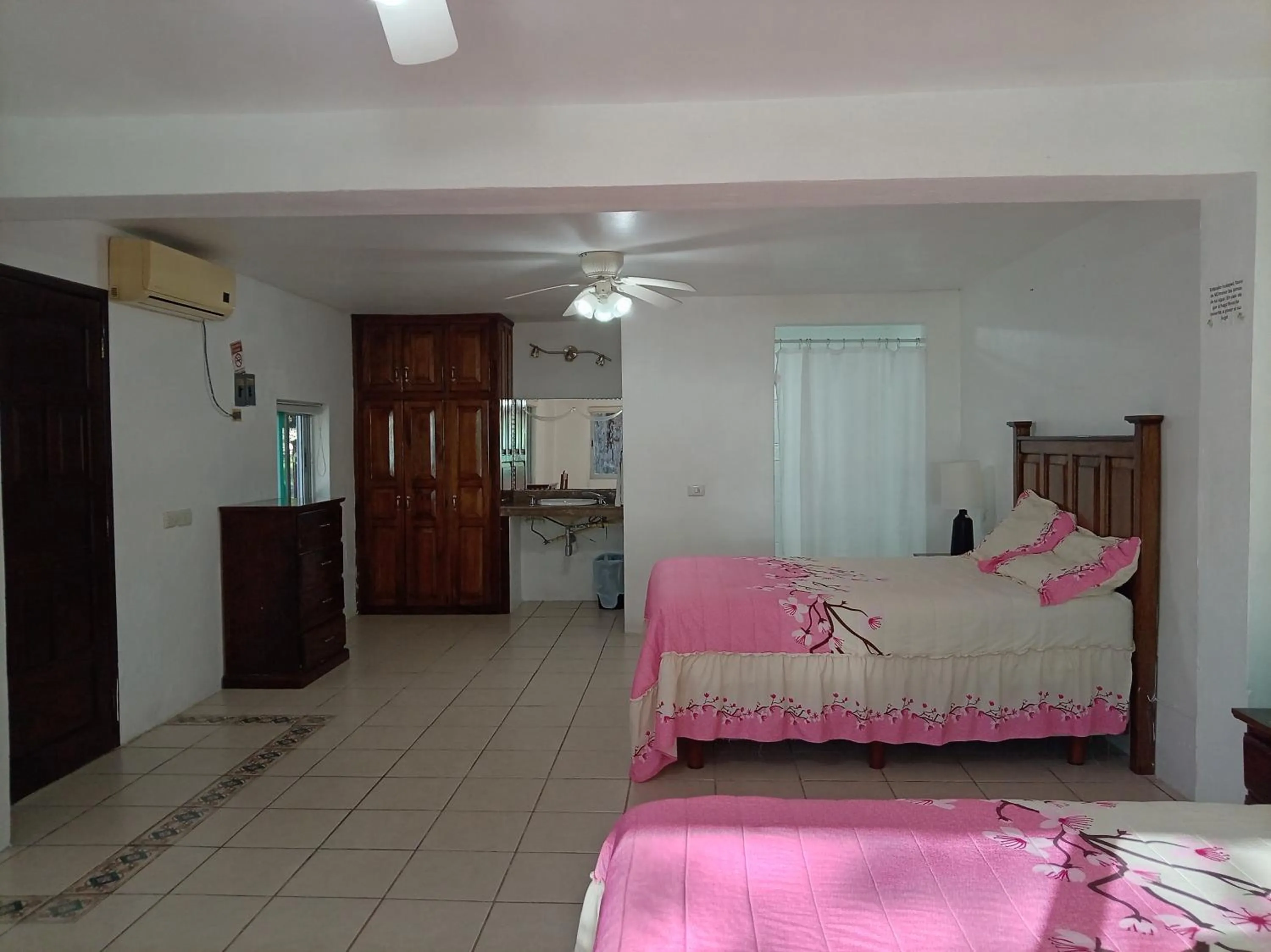 Bed in Freedom Shores "La Gringa" Hotel - Universally Designed