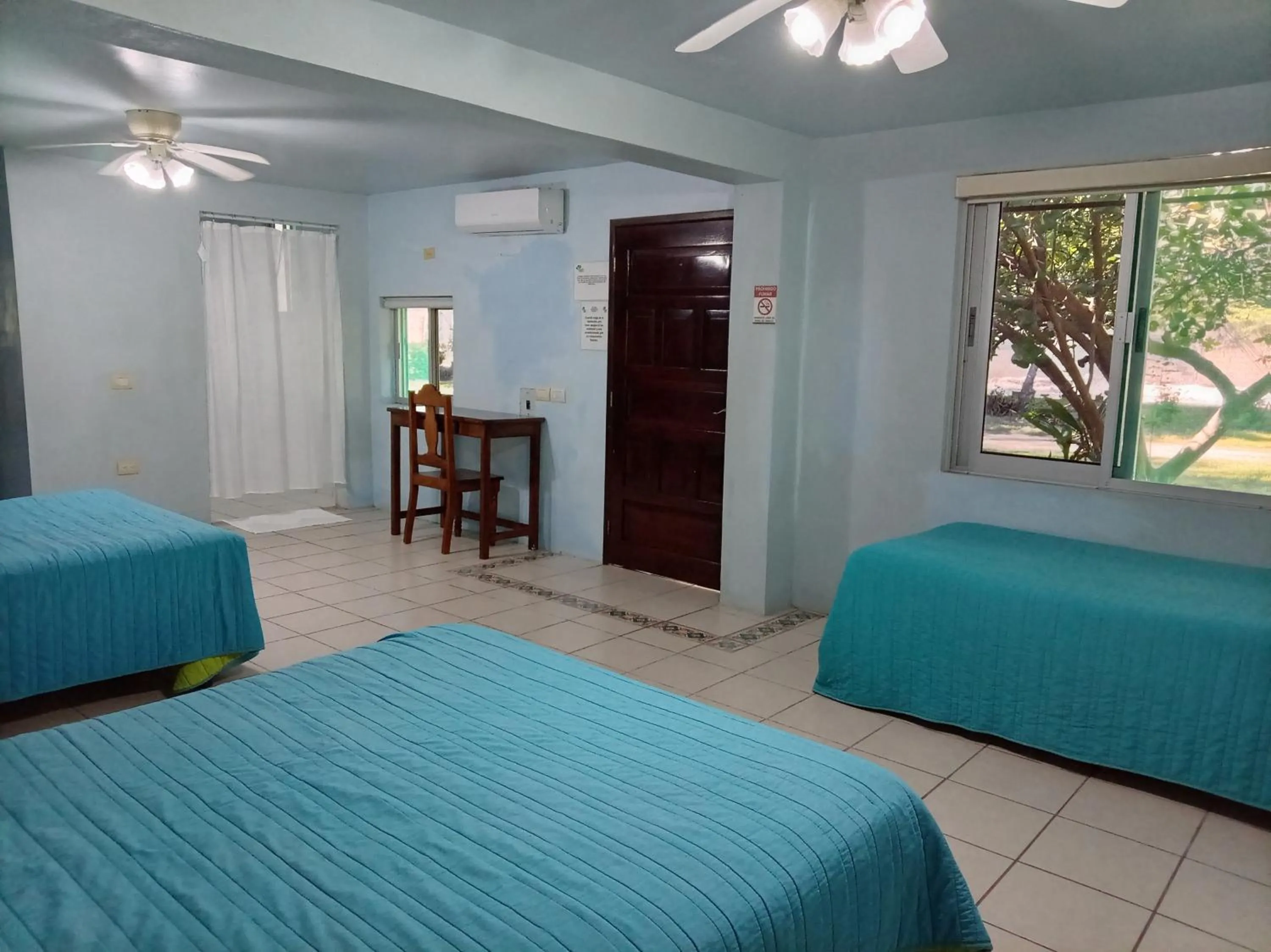 Bed in Freedom Shores "La Gringa" Hotel - Universally Designed