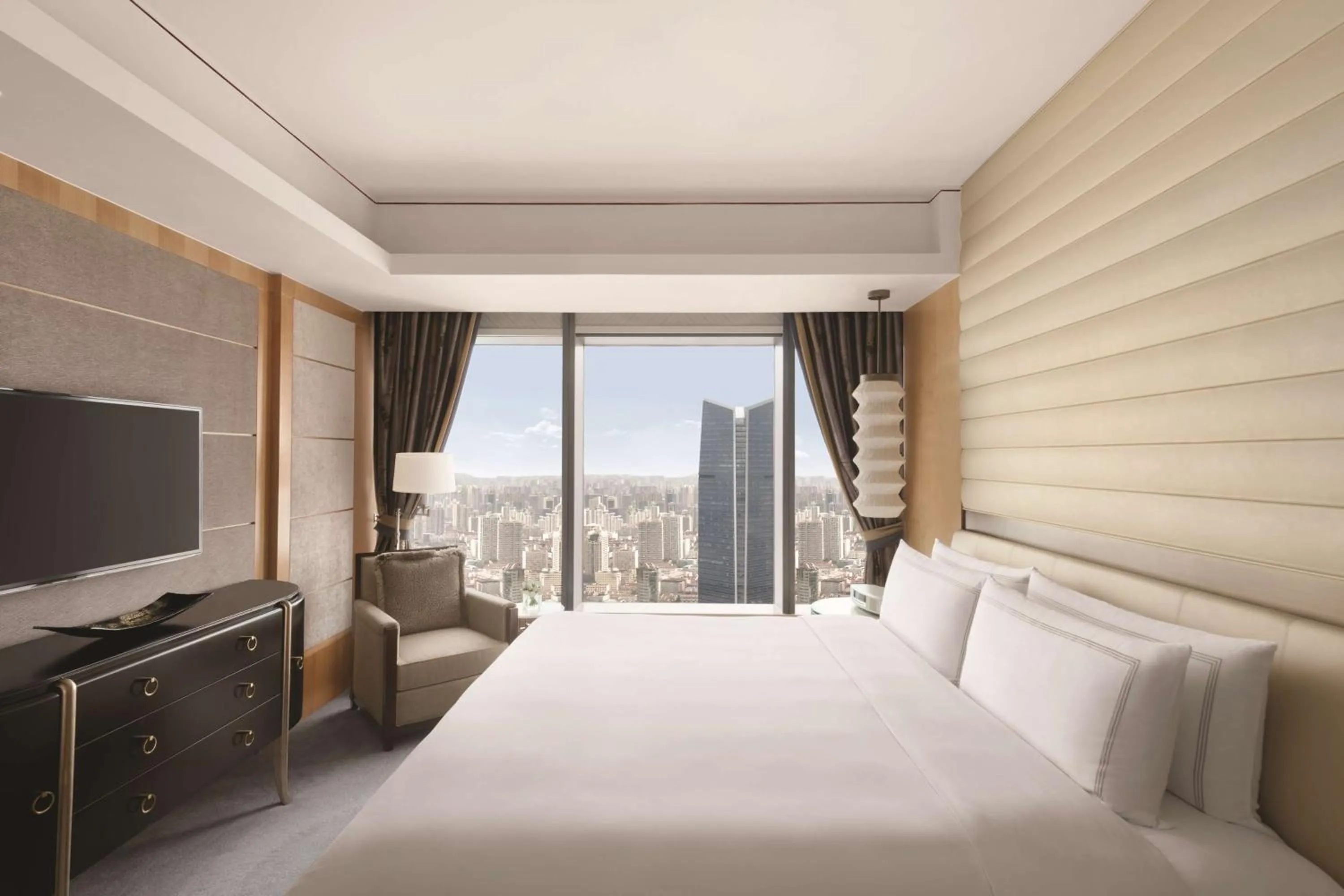 Photo of the whole room, Bed in Jing An Shangri-La, Shanghai - sits centrally amid Puxi's iconic landmarks, uniquely positioned nearby Jing'an Temple