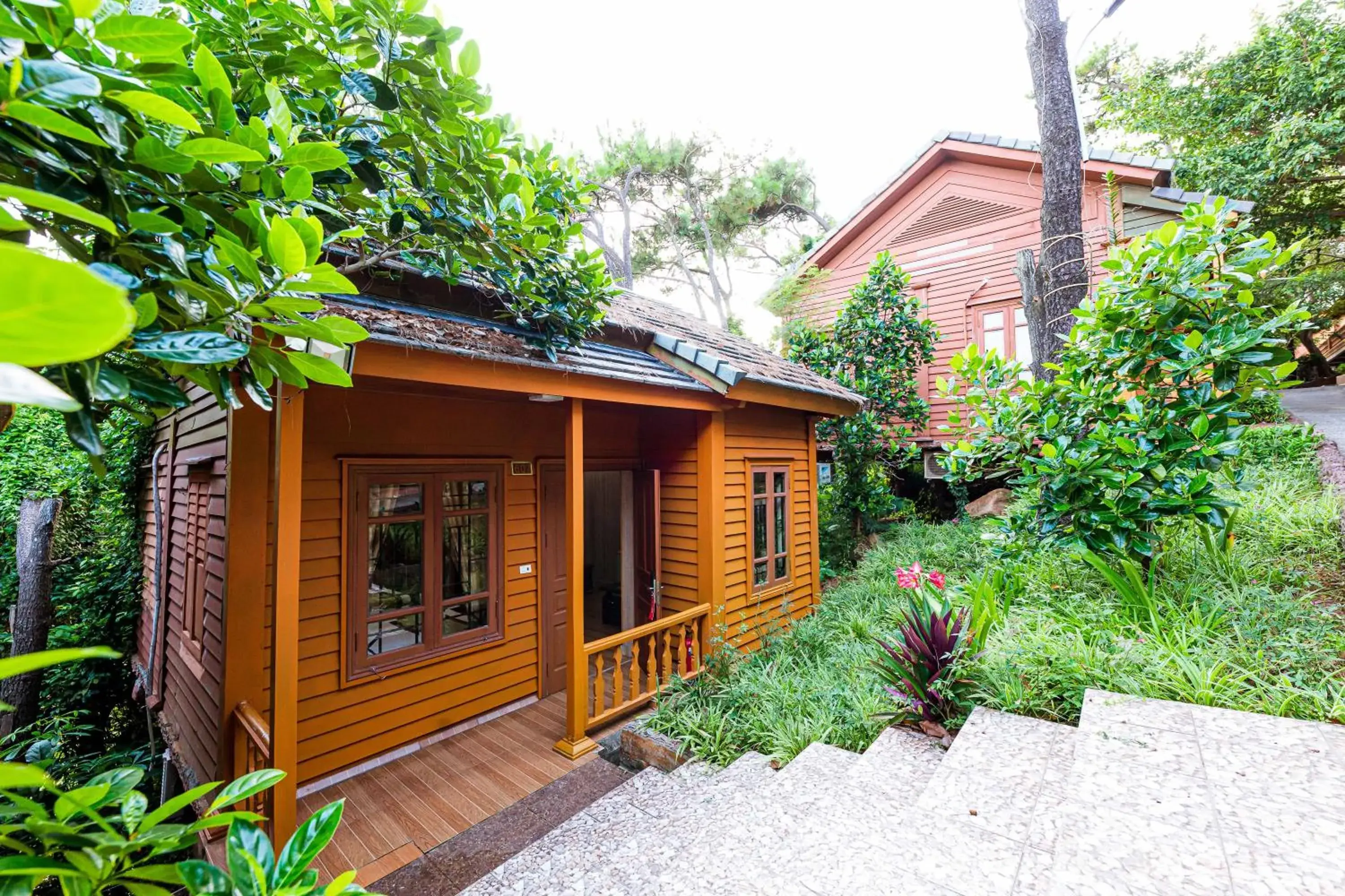 Deluxe Bungalow with Garden View in Hon Dau Resort Deluxe Bungalow with Garden View in Hon Dau Resort