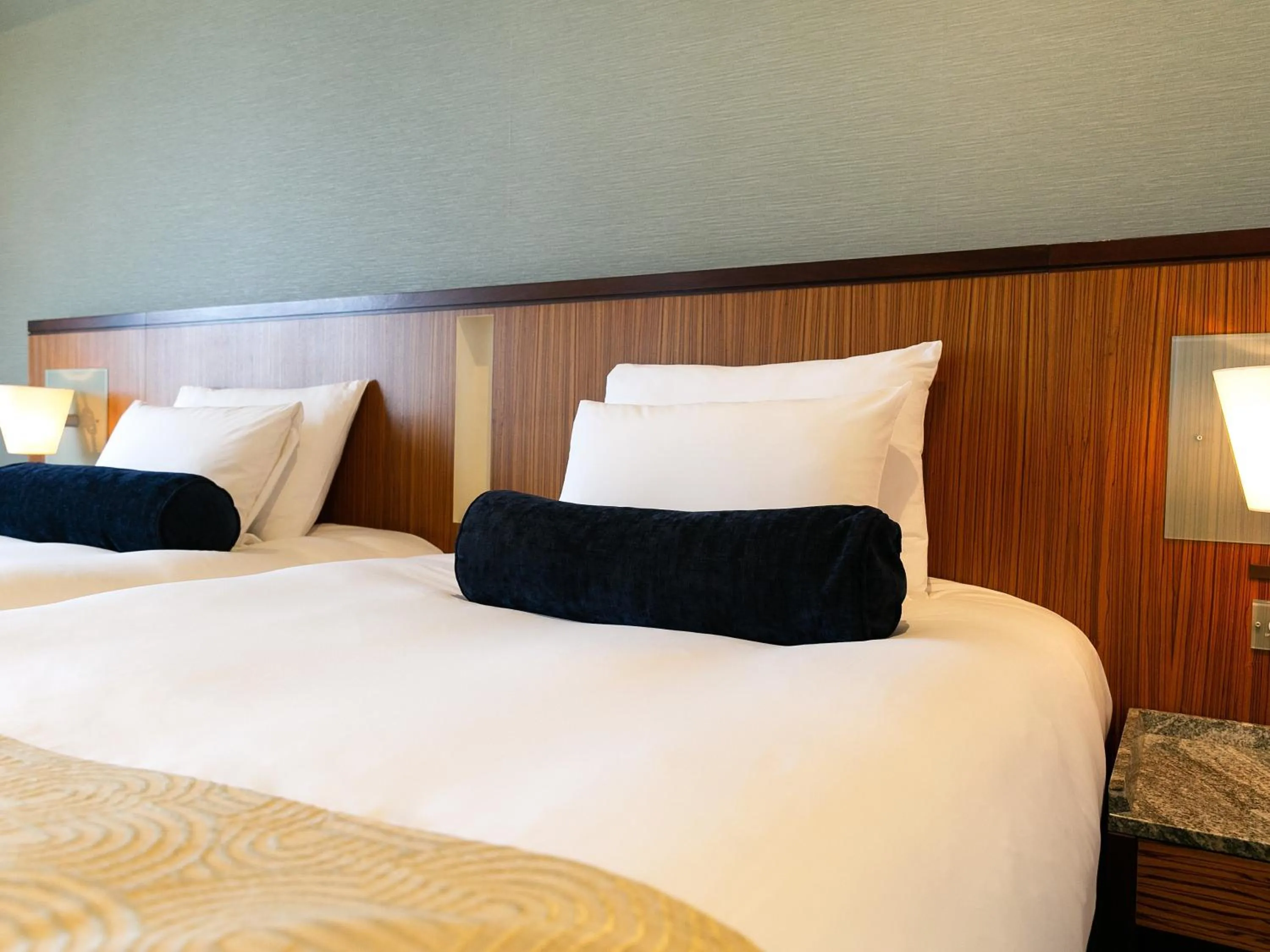 Bed in Hotel Nikko Alivila