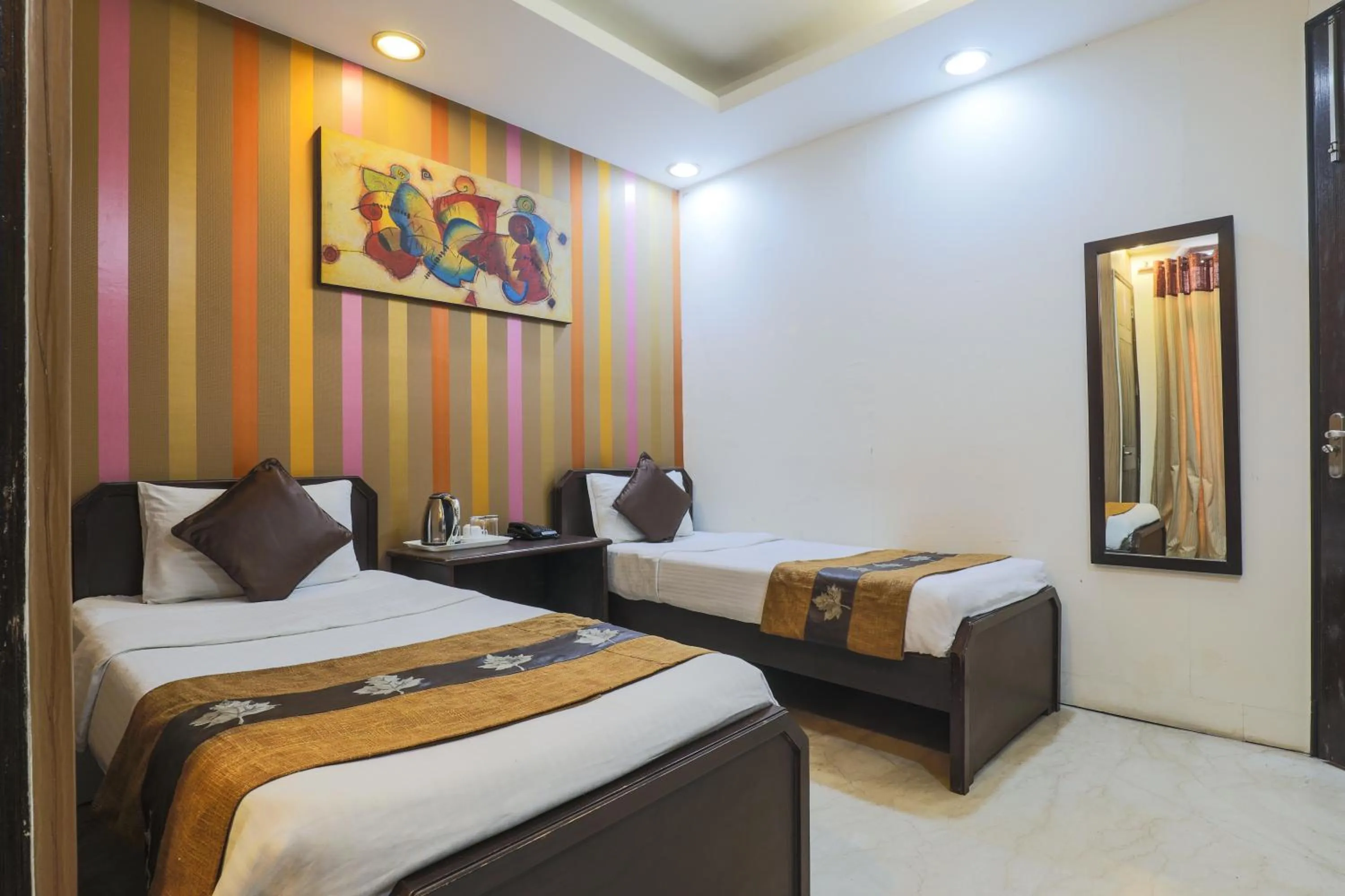 Photo of the whole room, Bed in Hermitage by The Cosy Hotels Near Lotus Temple