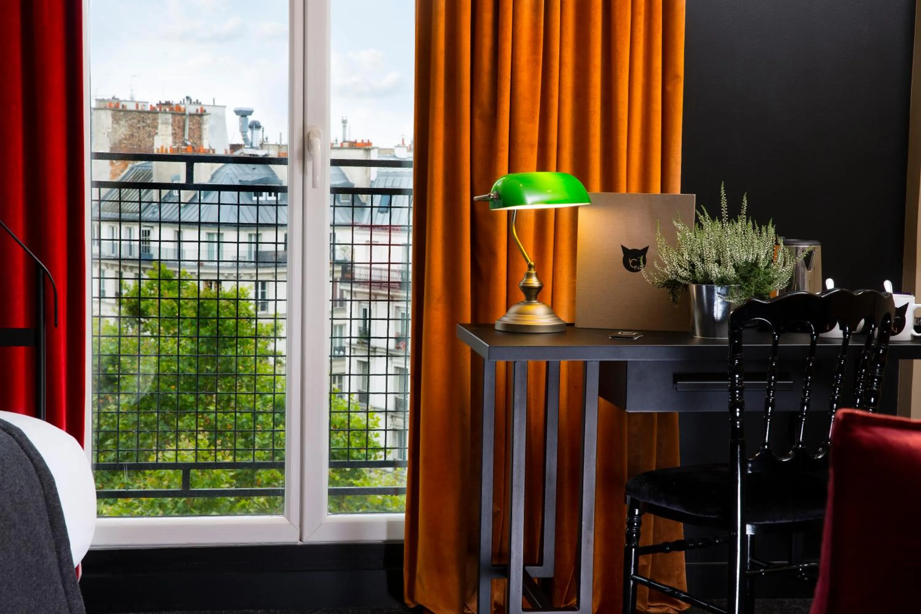 Bedroom in Hotel Le Chat Noir