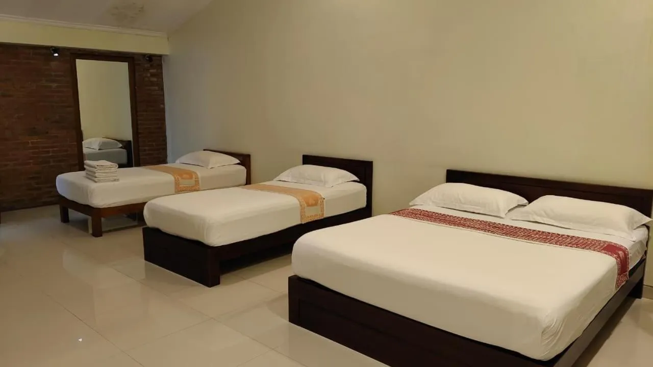 Bed in Puri Pangeran Hotel