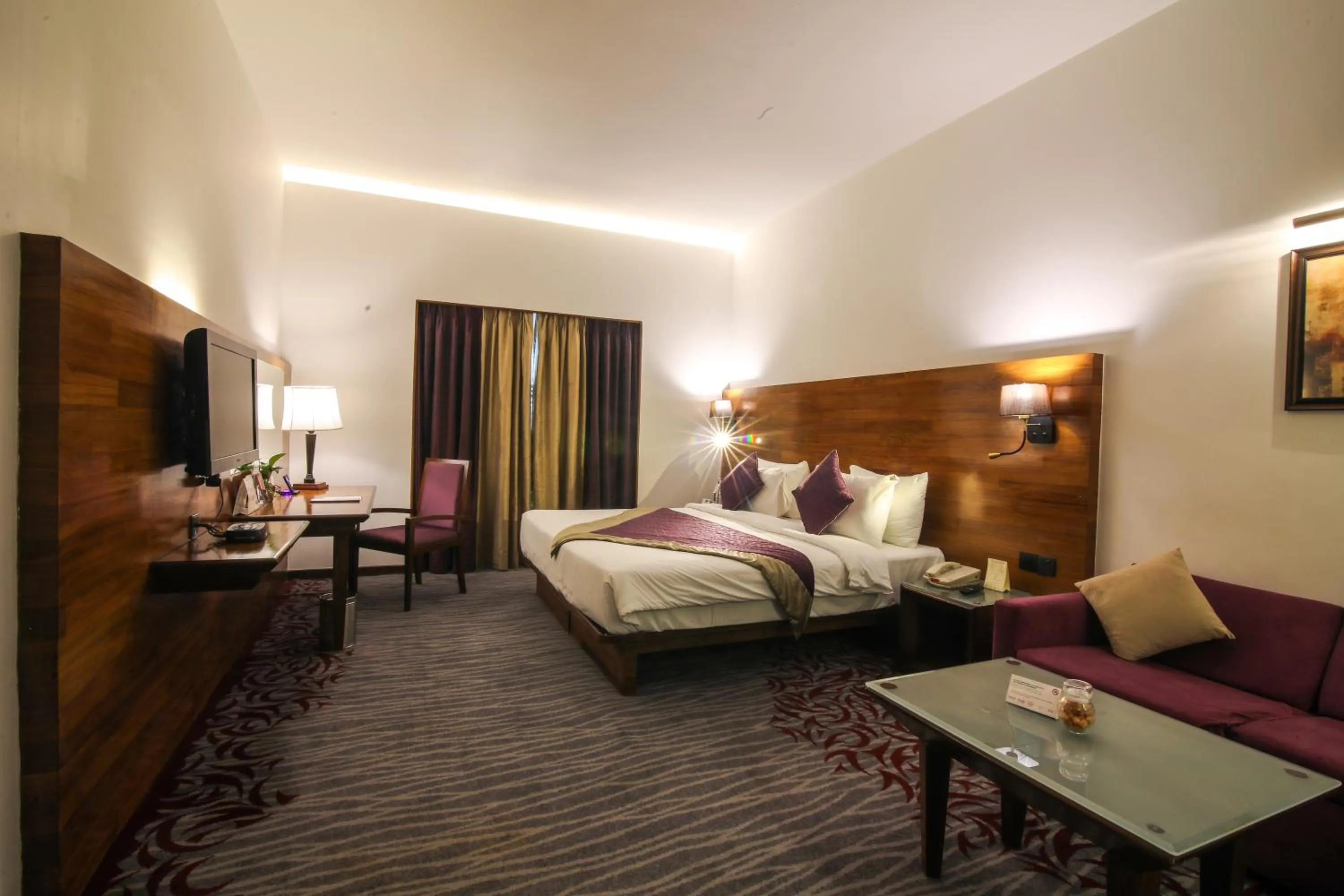 Bed in The Orchid Hotel Hinjewadi Pune