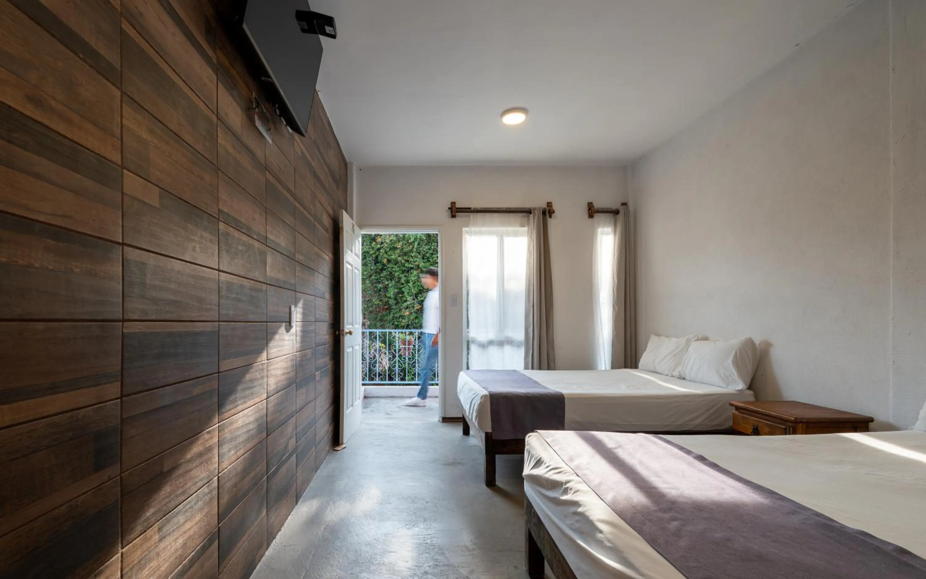 Bed in Hotel Posada Bugambilias