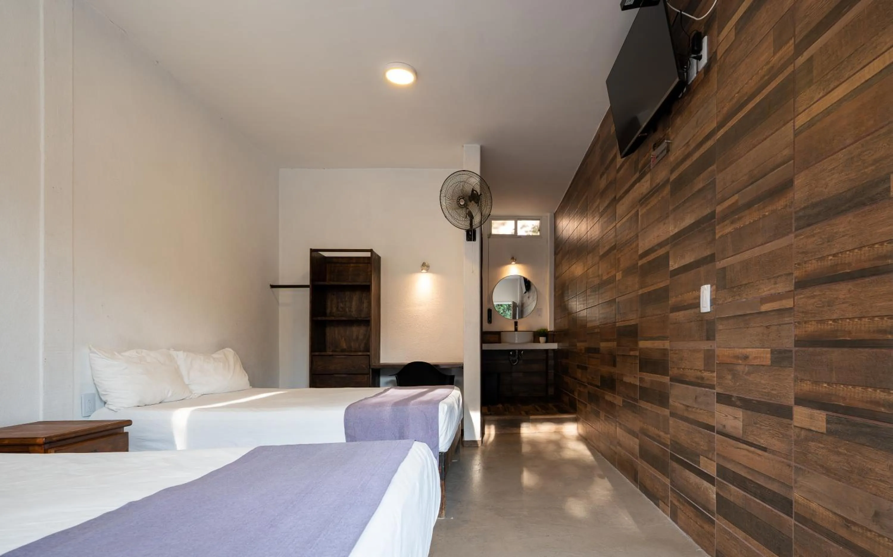 Bed in Hotel Posada Bugambilias