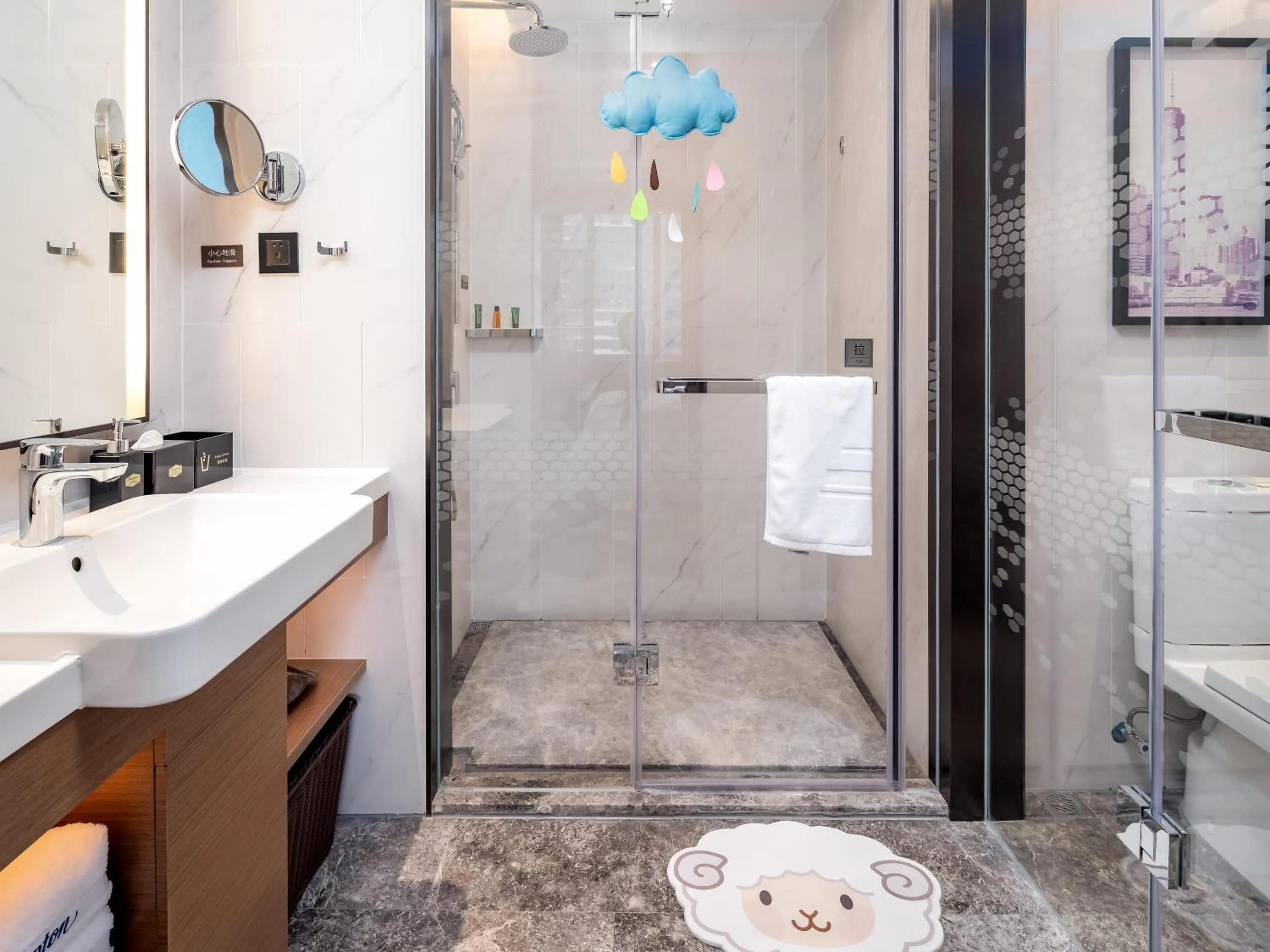 Toilet in Hampton by Hilton Qinhuangdao Jinmeng Bay