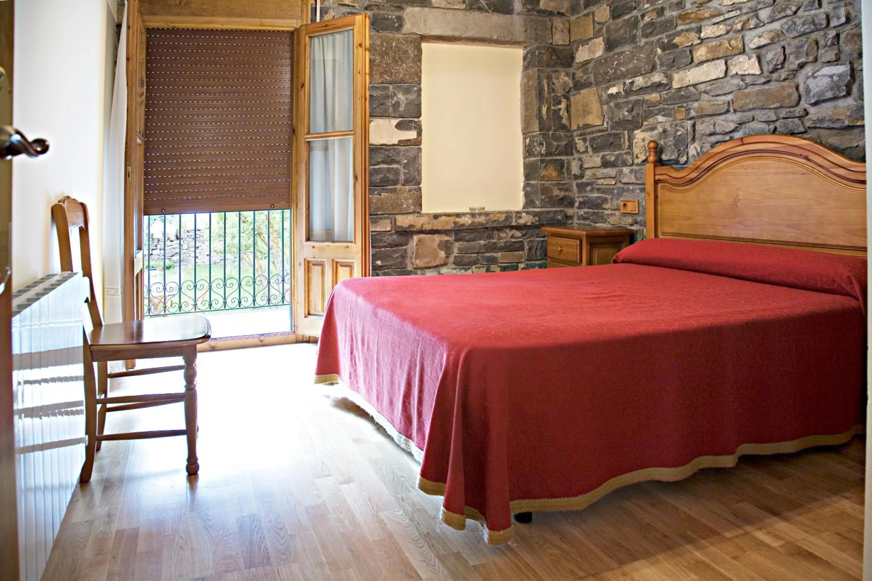 Bedroom, Bed in Apartamentos Casa Buisan