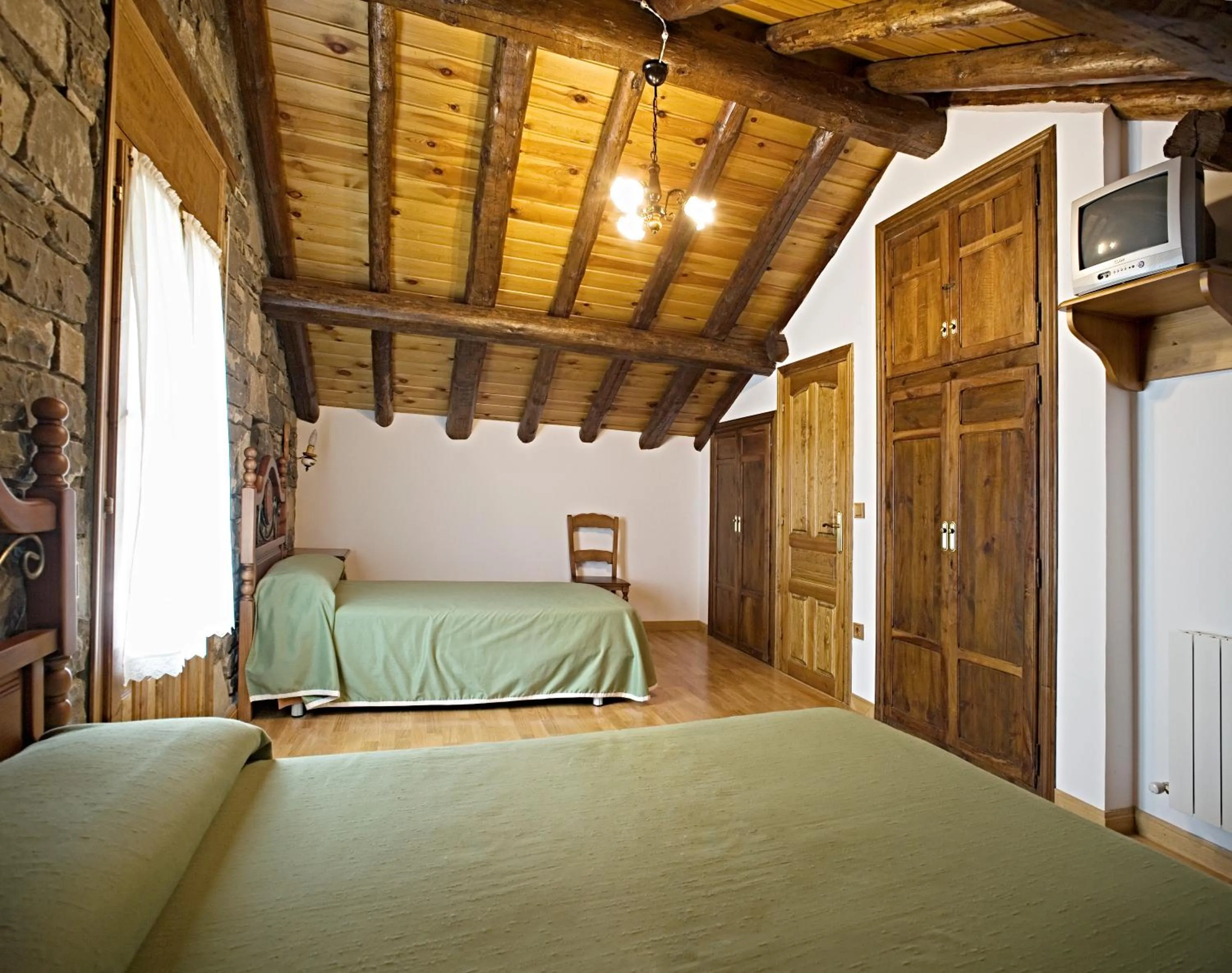 Bedroom, Bed in Apartamentos Casa Buisan