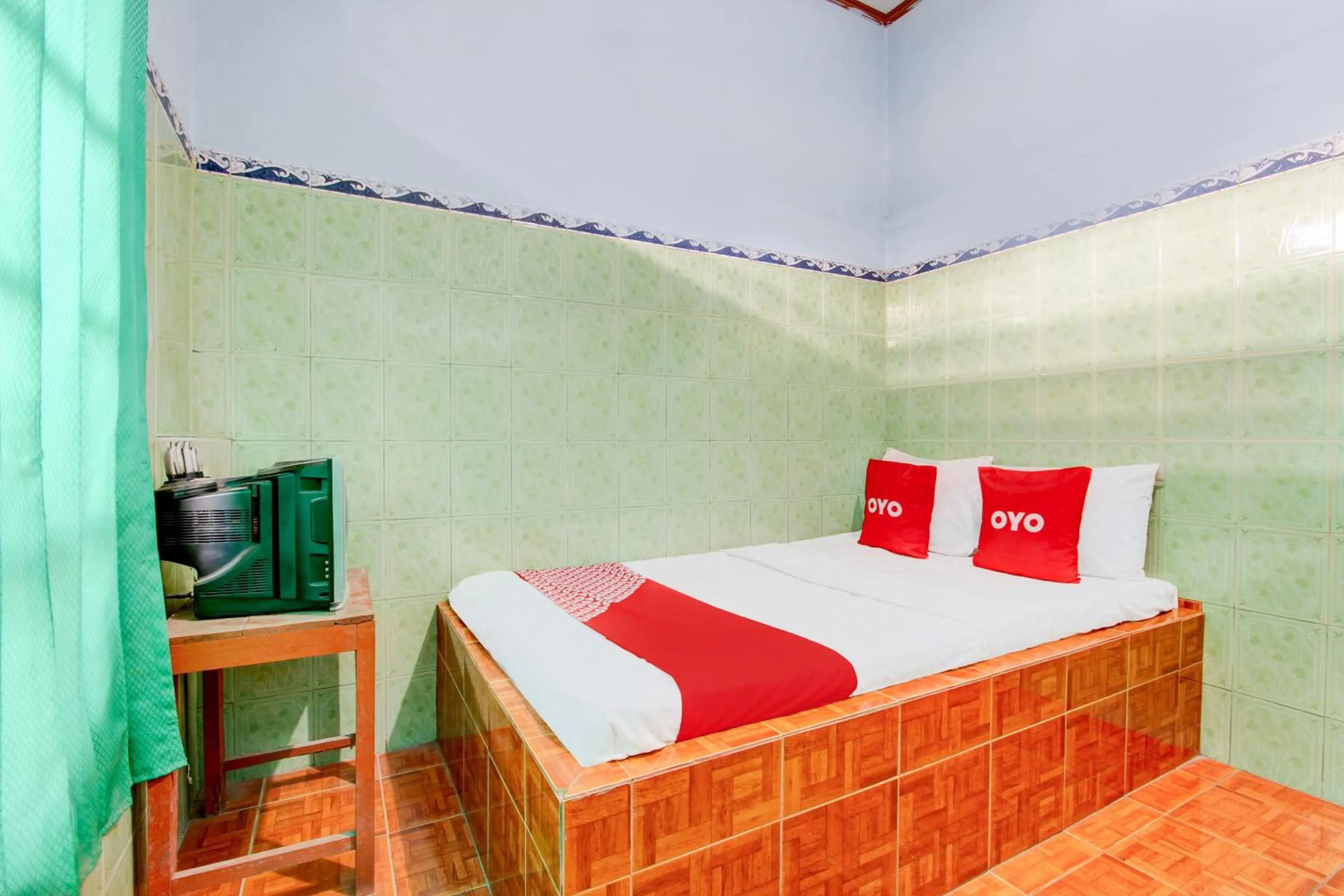 Bedroom, Bed in Hotel O Homestay Baronsari