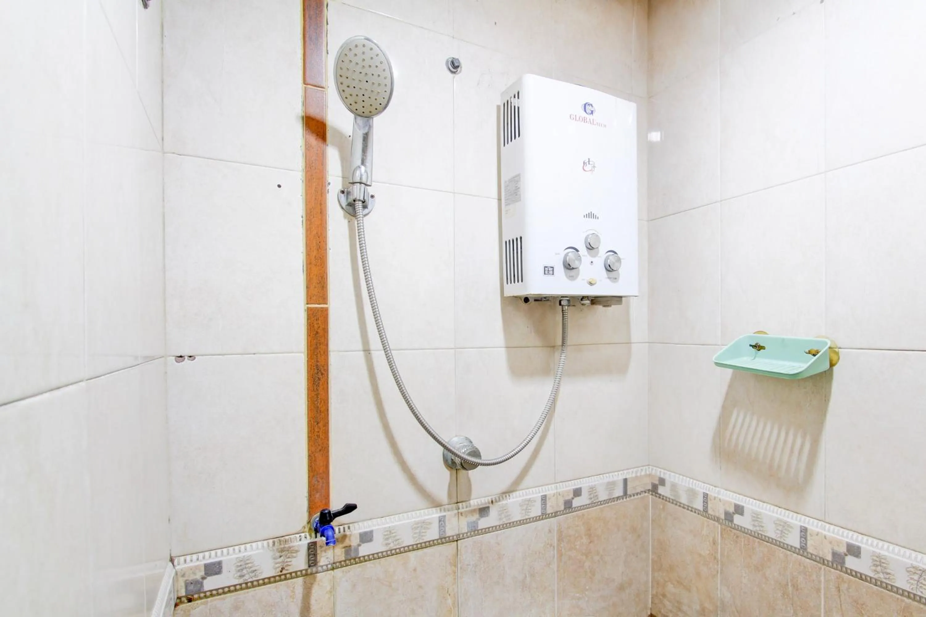 Bathroom in Hotel O Homestay Baronsari