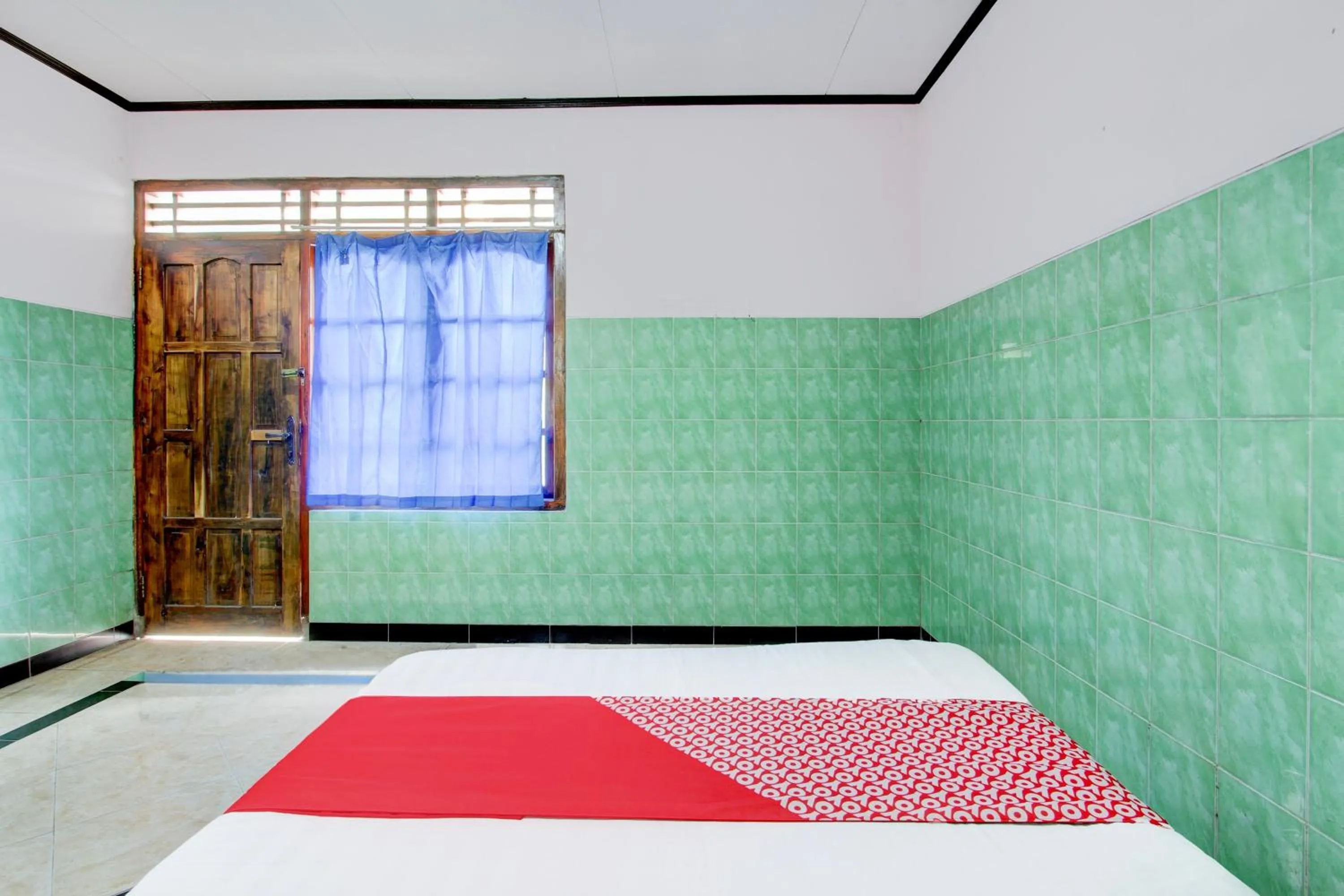 Bedroom, Bed in Hotel O Homestay Baronsari