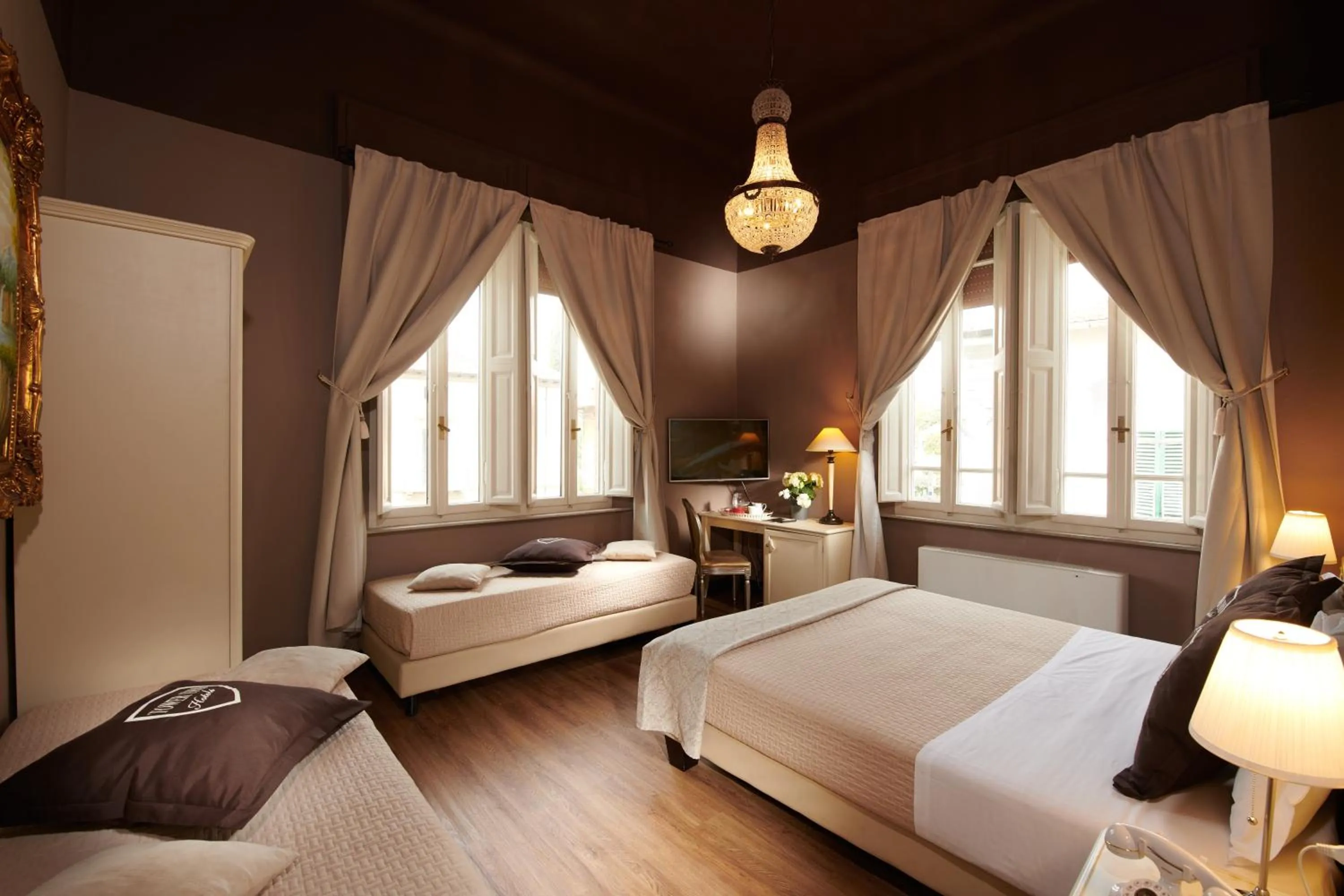 Bed in Villa Tower Inn