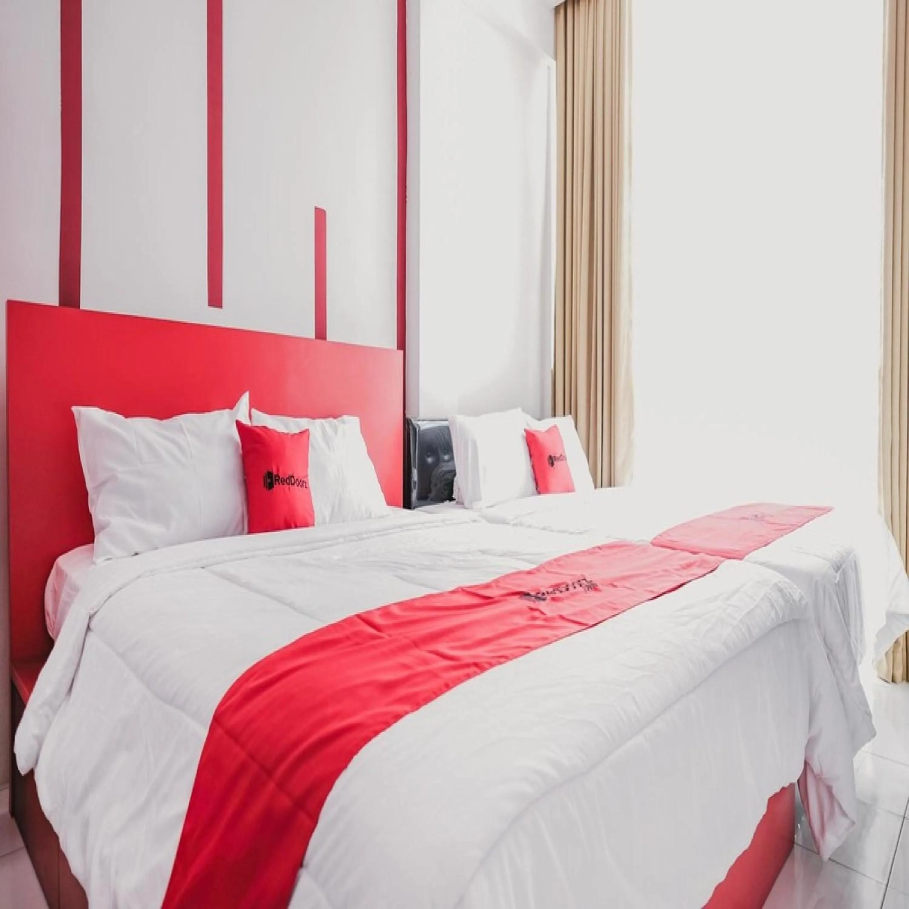 Bed in RedDoorz @ Jalan Sukabangun 2 Palembang