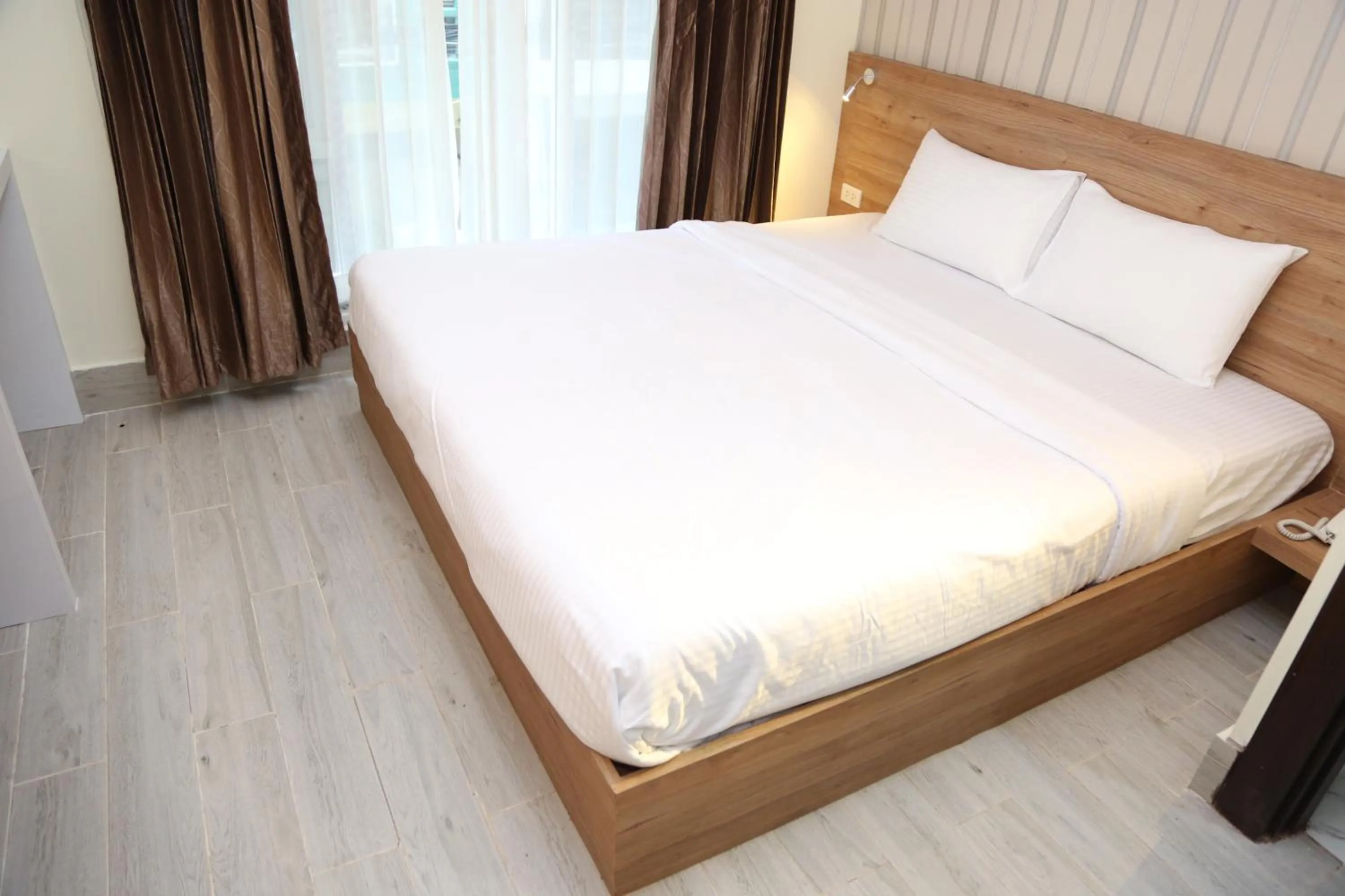 Bed in Rose Nana Hotel