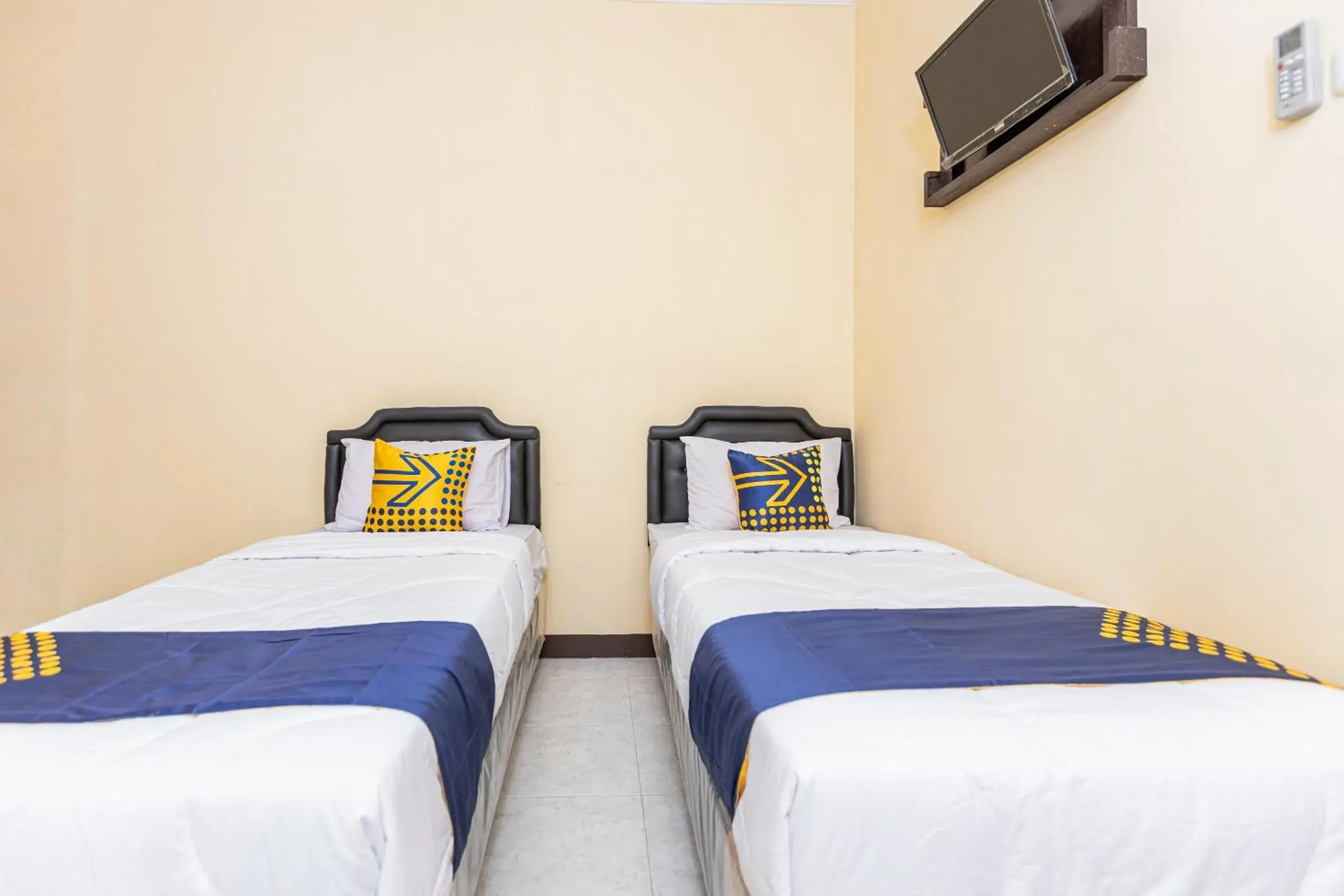 Bedroom in Hotel O Pondok Ripuji Bedroom in Hotel O Pondok Ripuji