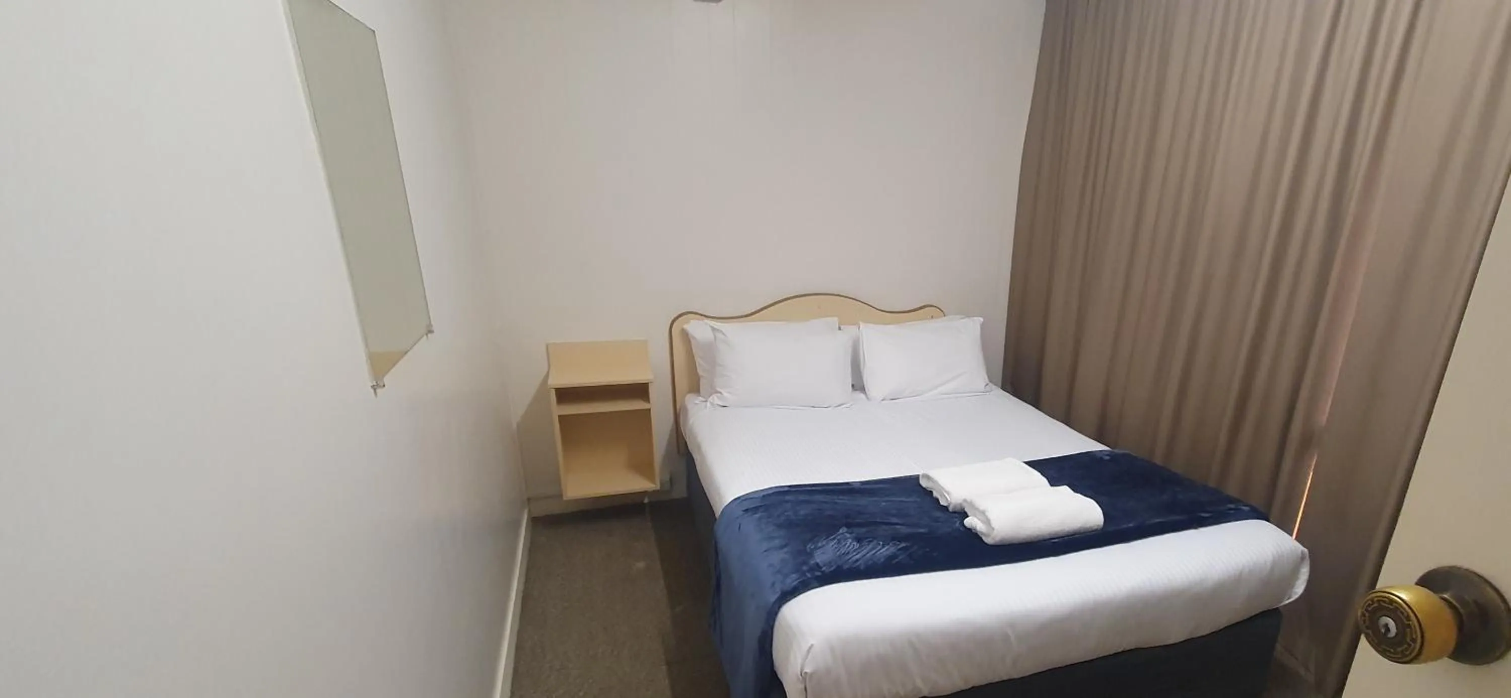 Bed in Billabong Motel