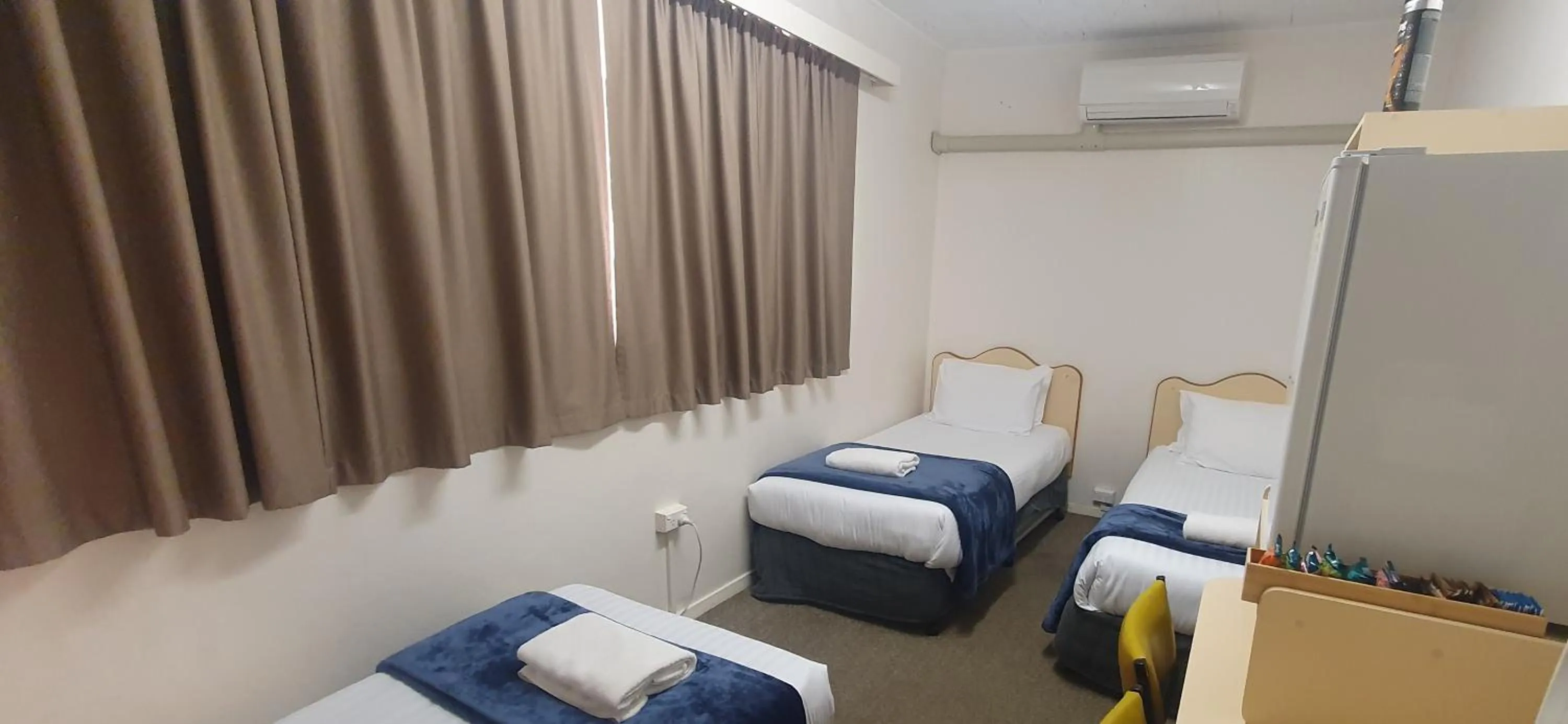 Bed in Billabong Motel