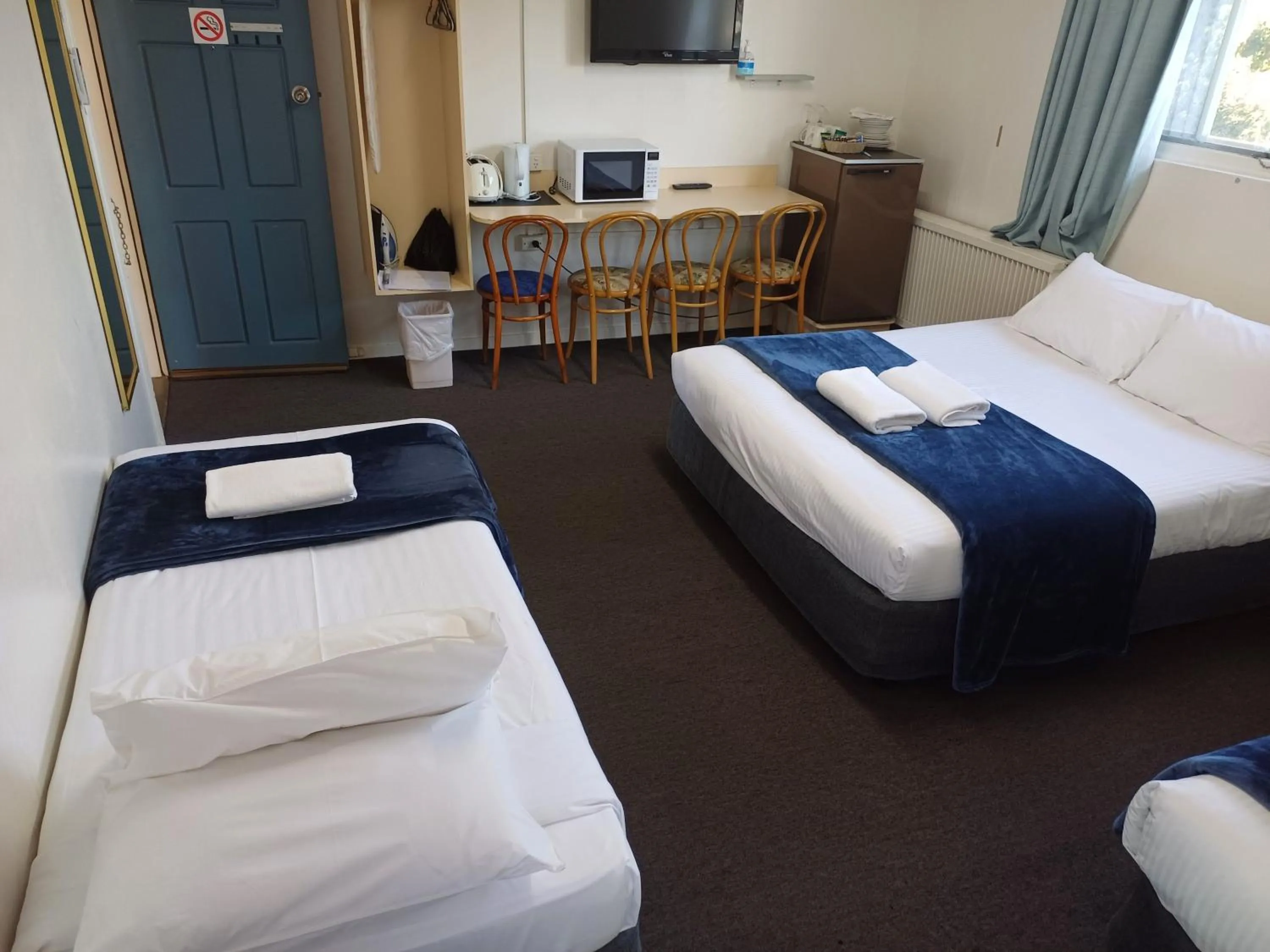 Bed in Billabong Motel