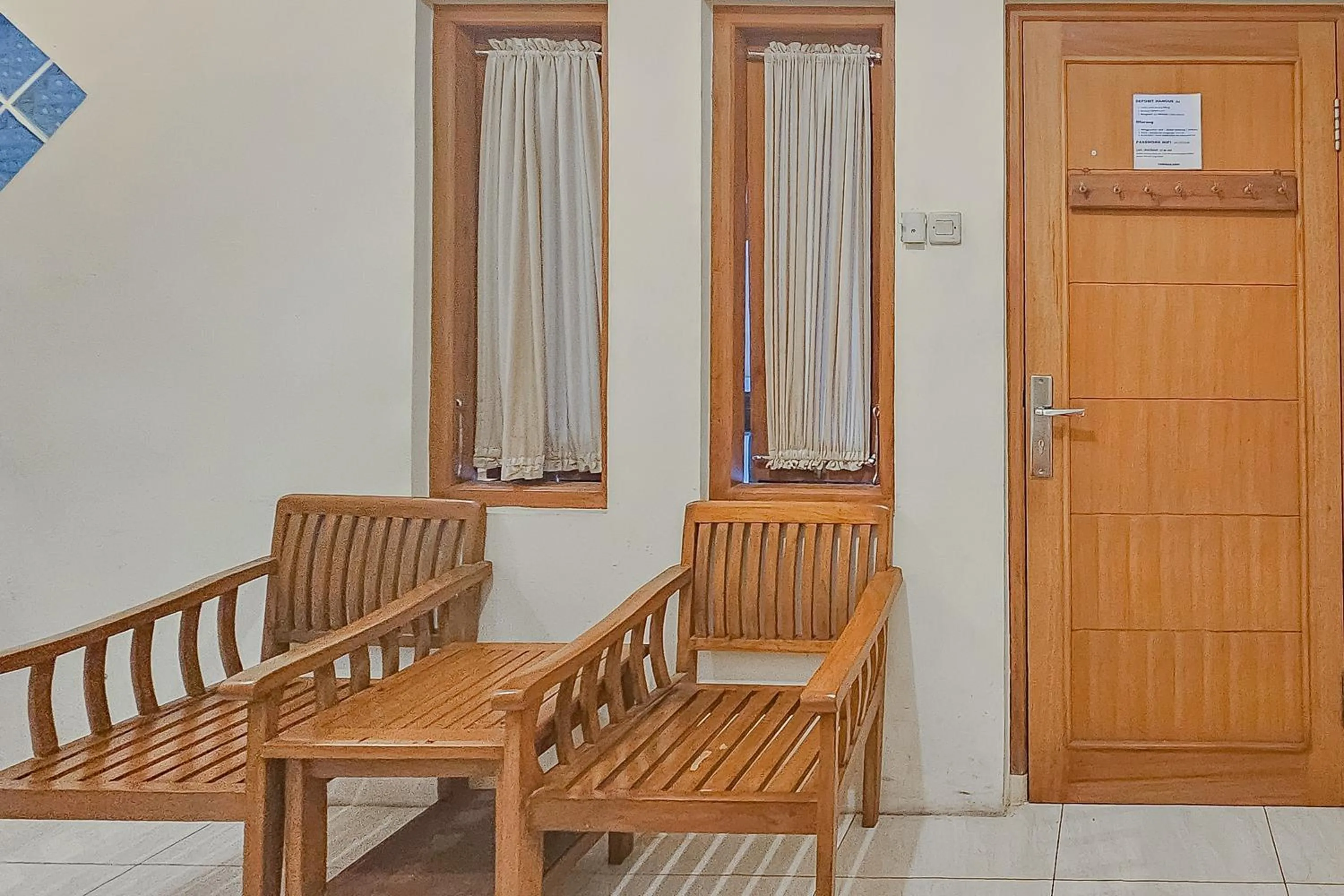 Bedroom in OYO 1982 Golf Papa Costel