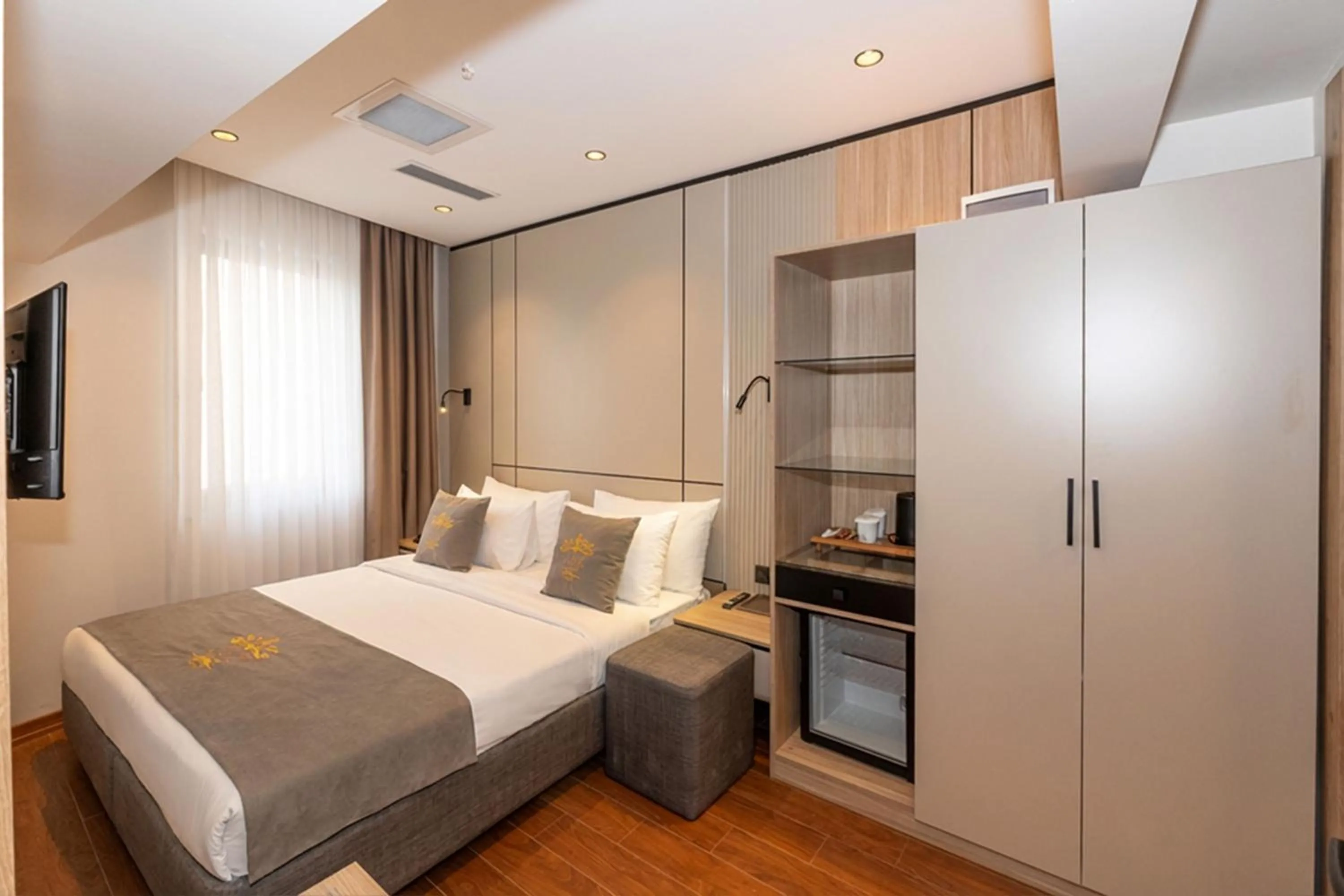 Bed in Yez Boutique Hotel