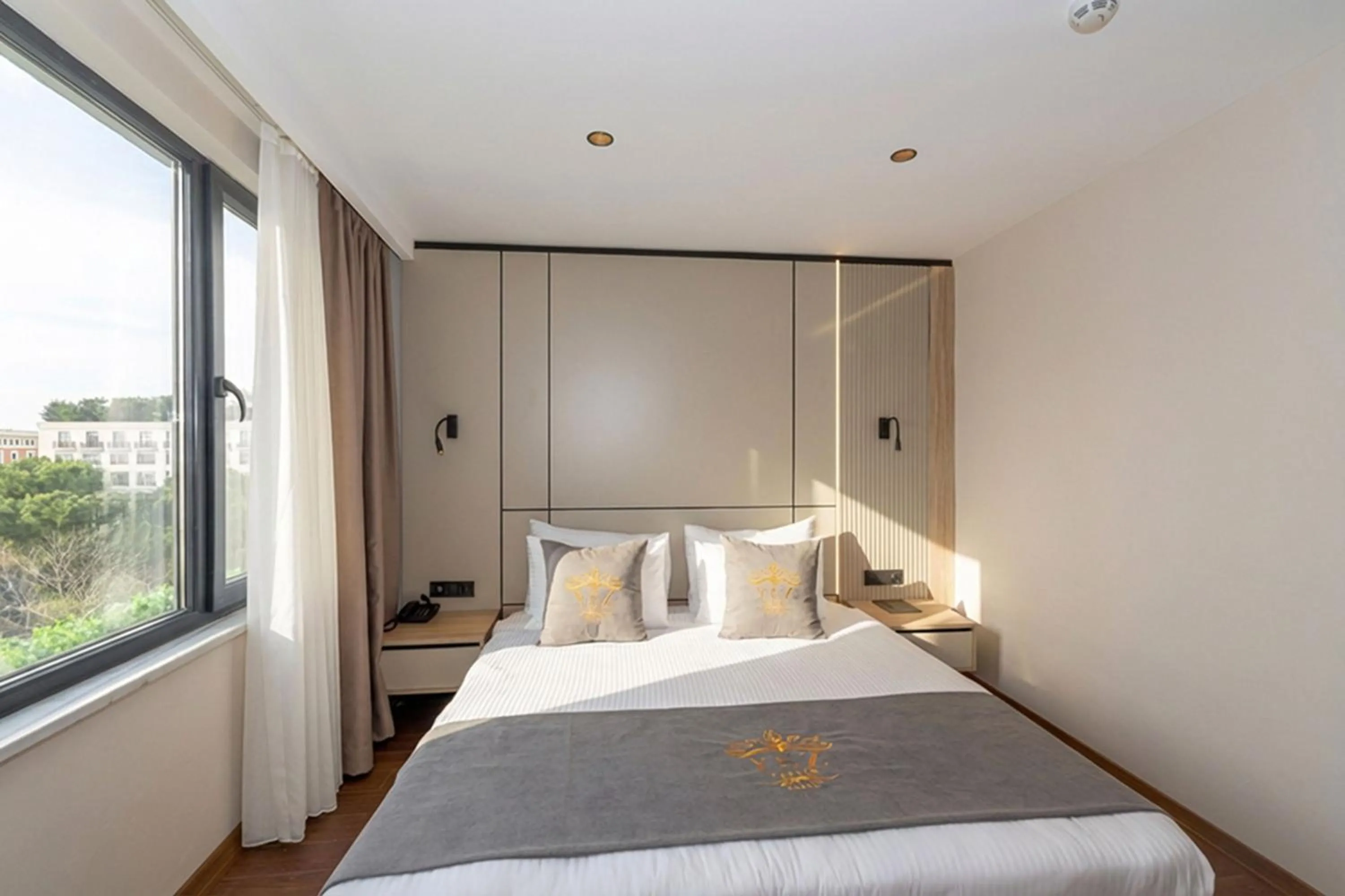 Bed in Yez Boutique Hotel