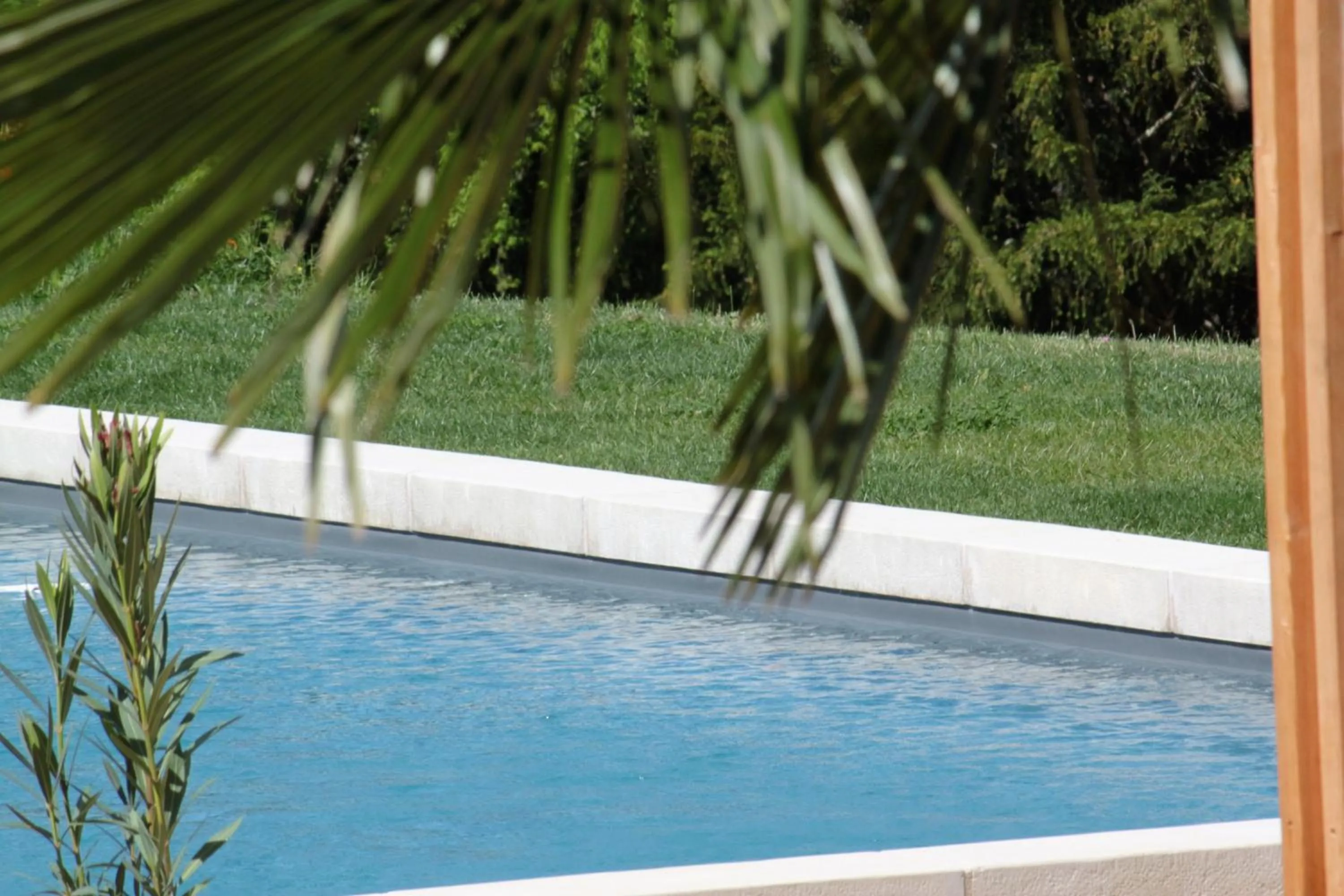 Pool view in Domaine Le Broual