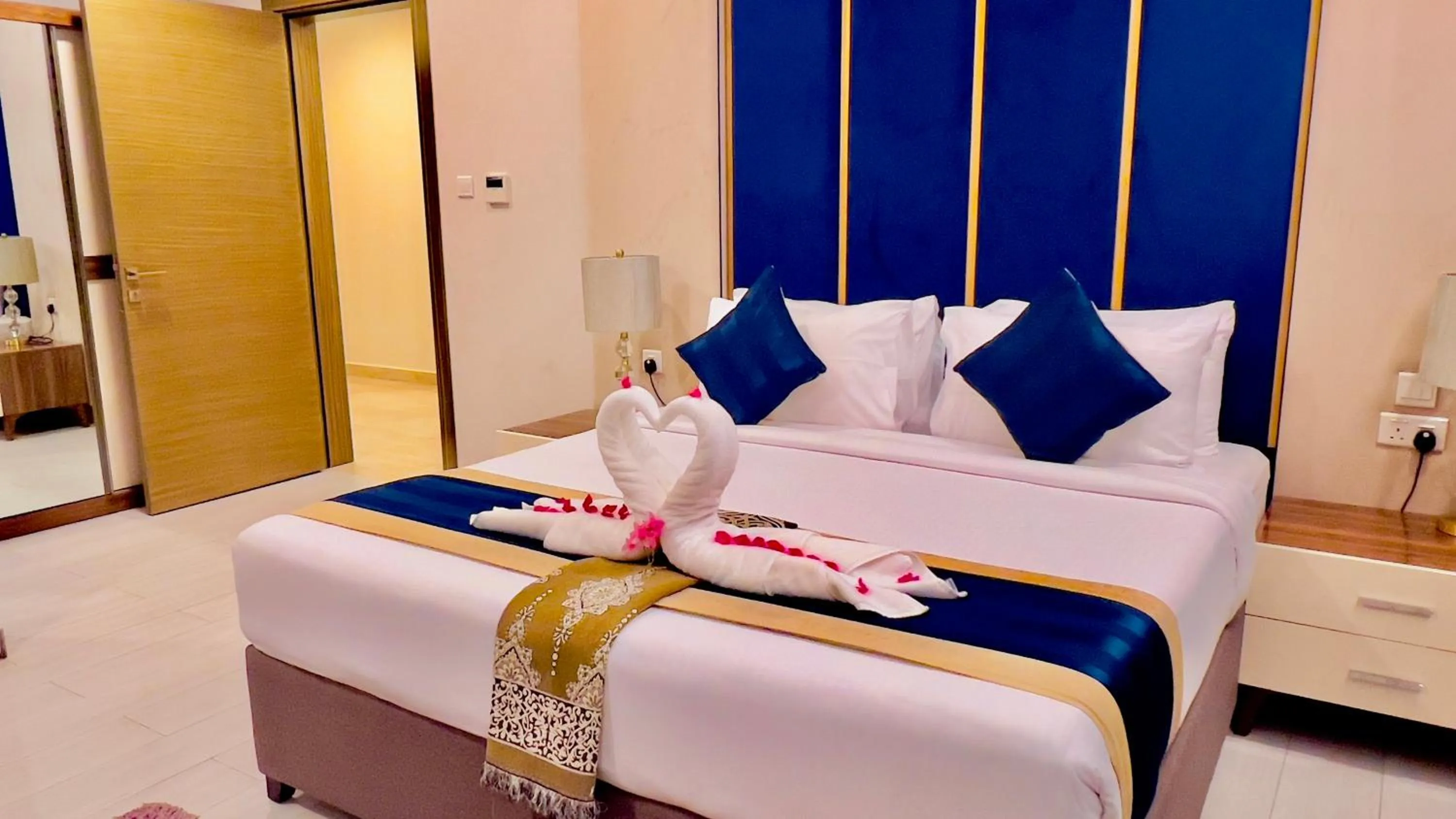 Bed in BW Suites & Spa