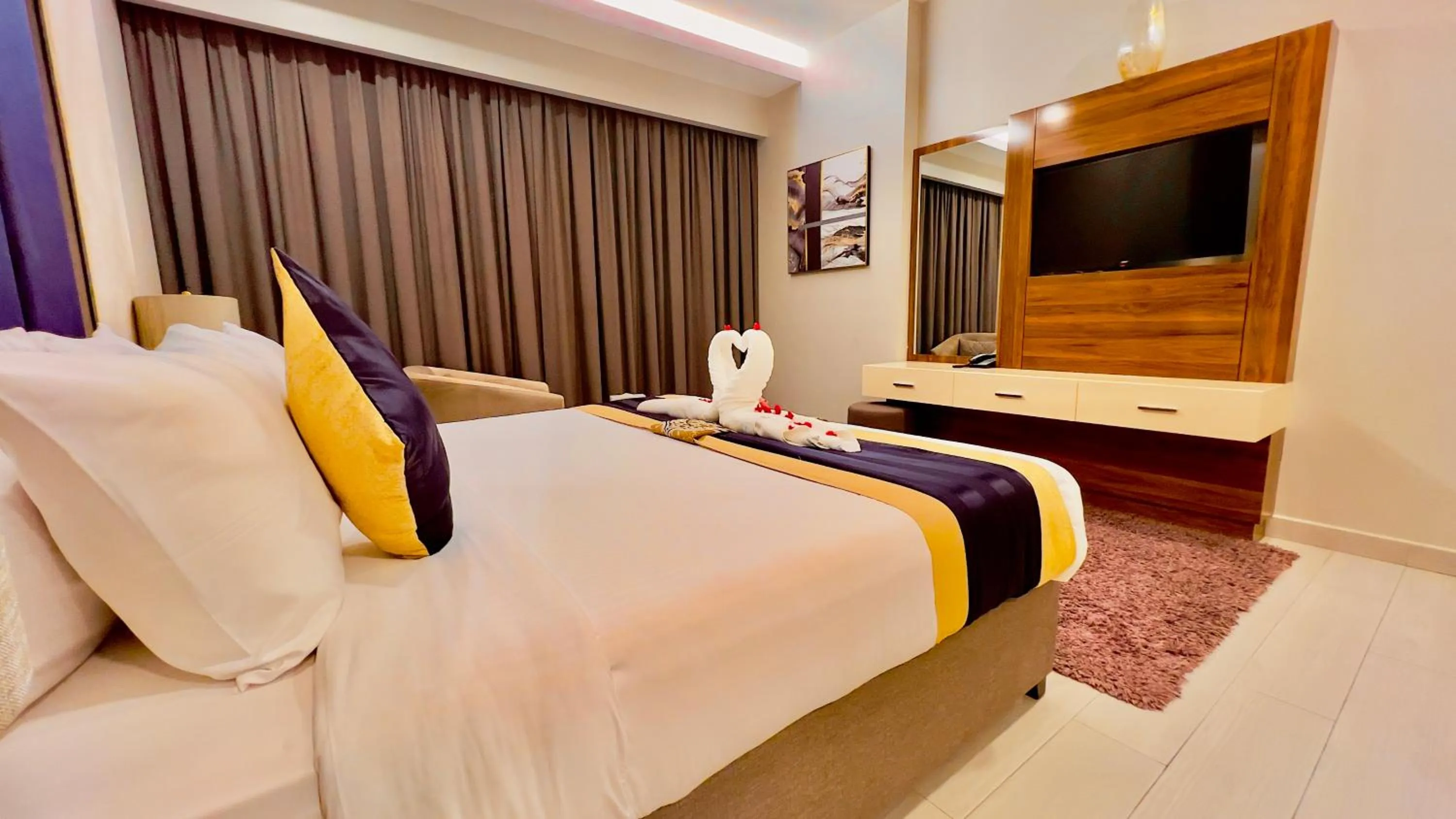 Bed in BW Suites & Spa