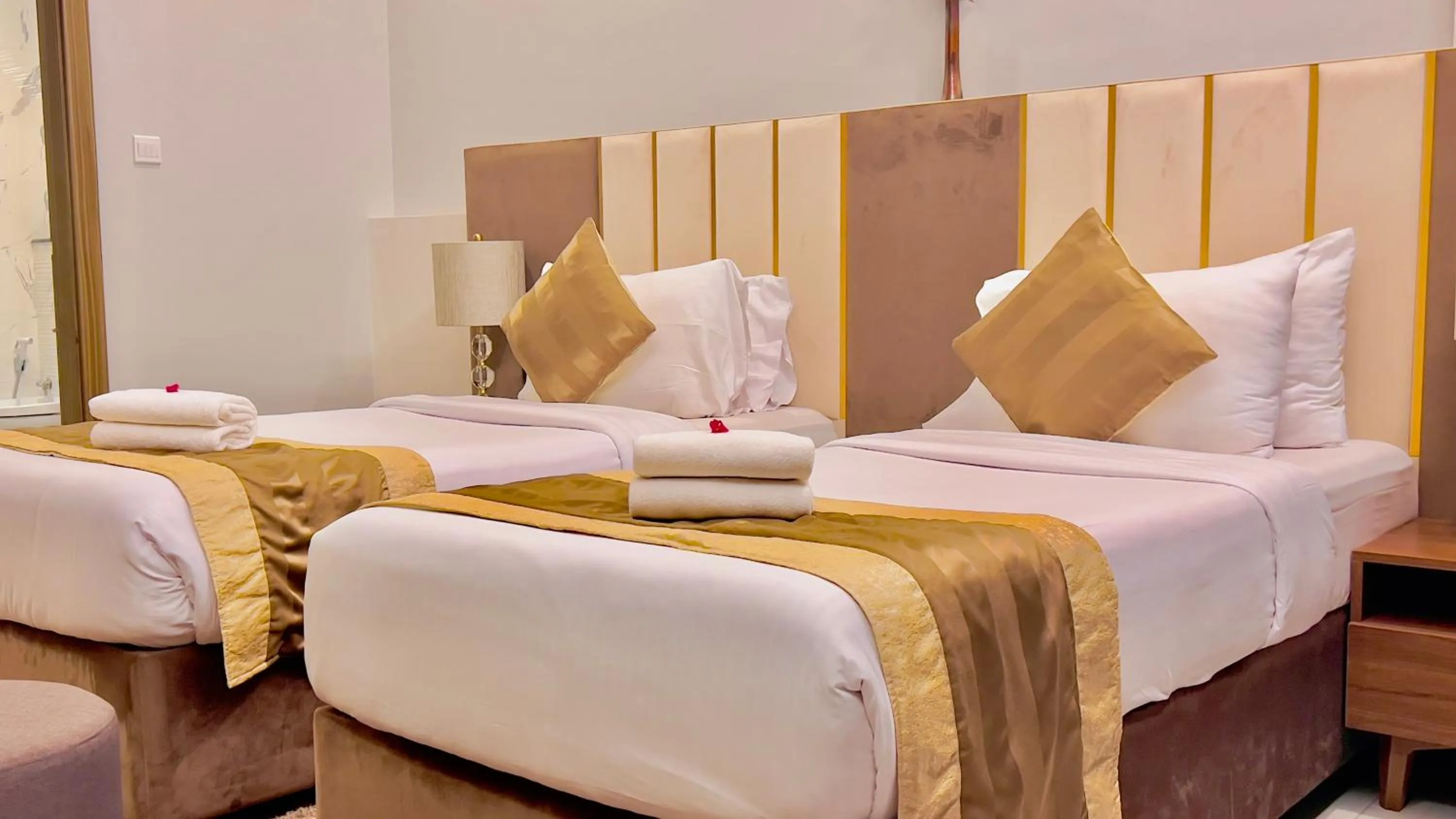 Bed in BW Suites & Spa