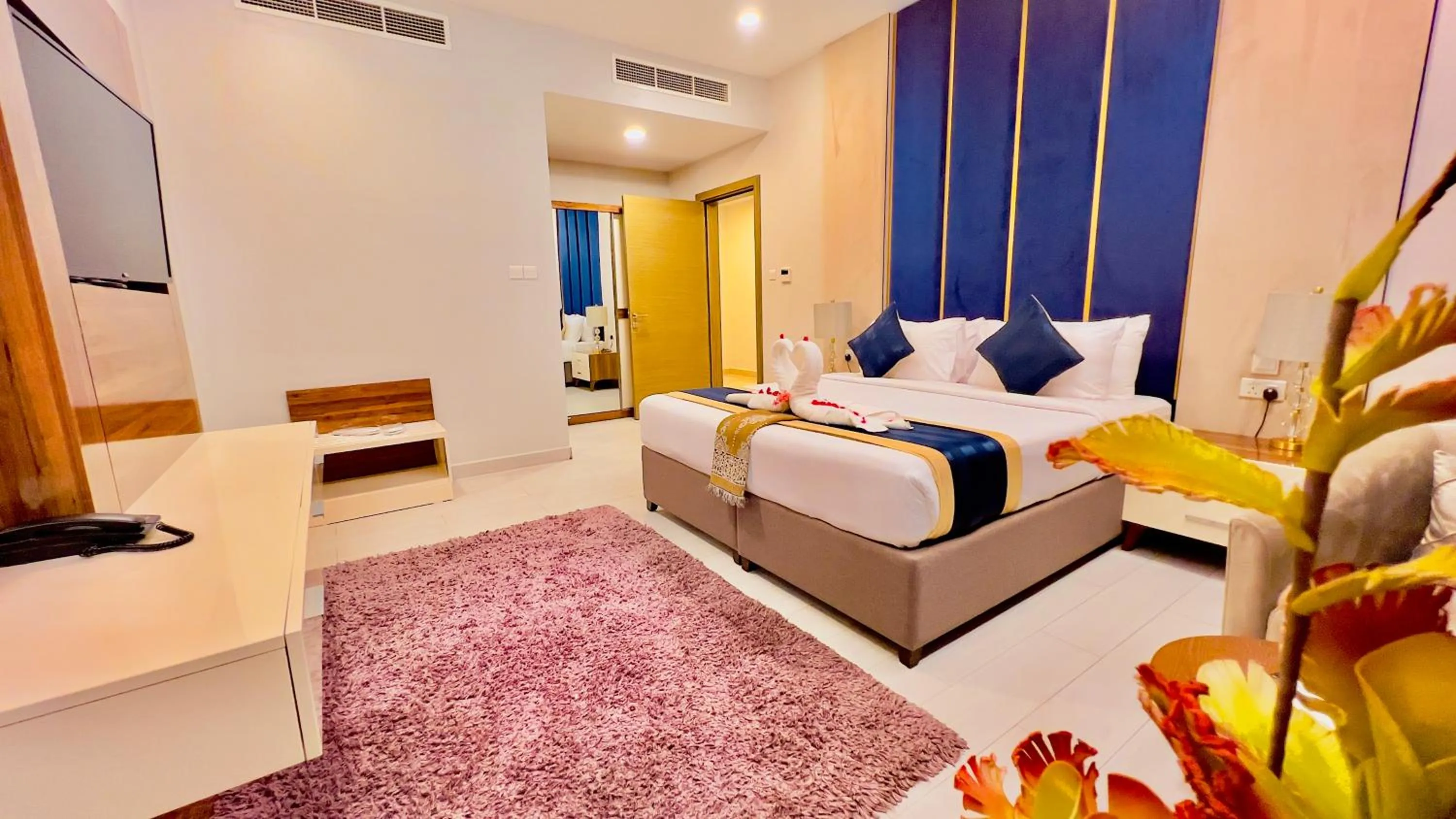 Bed in BW Suites & Spa